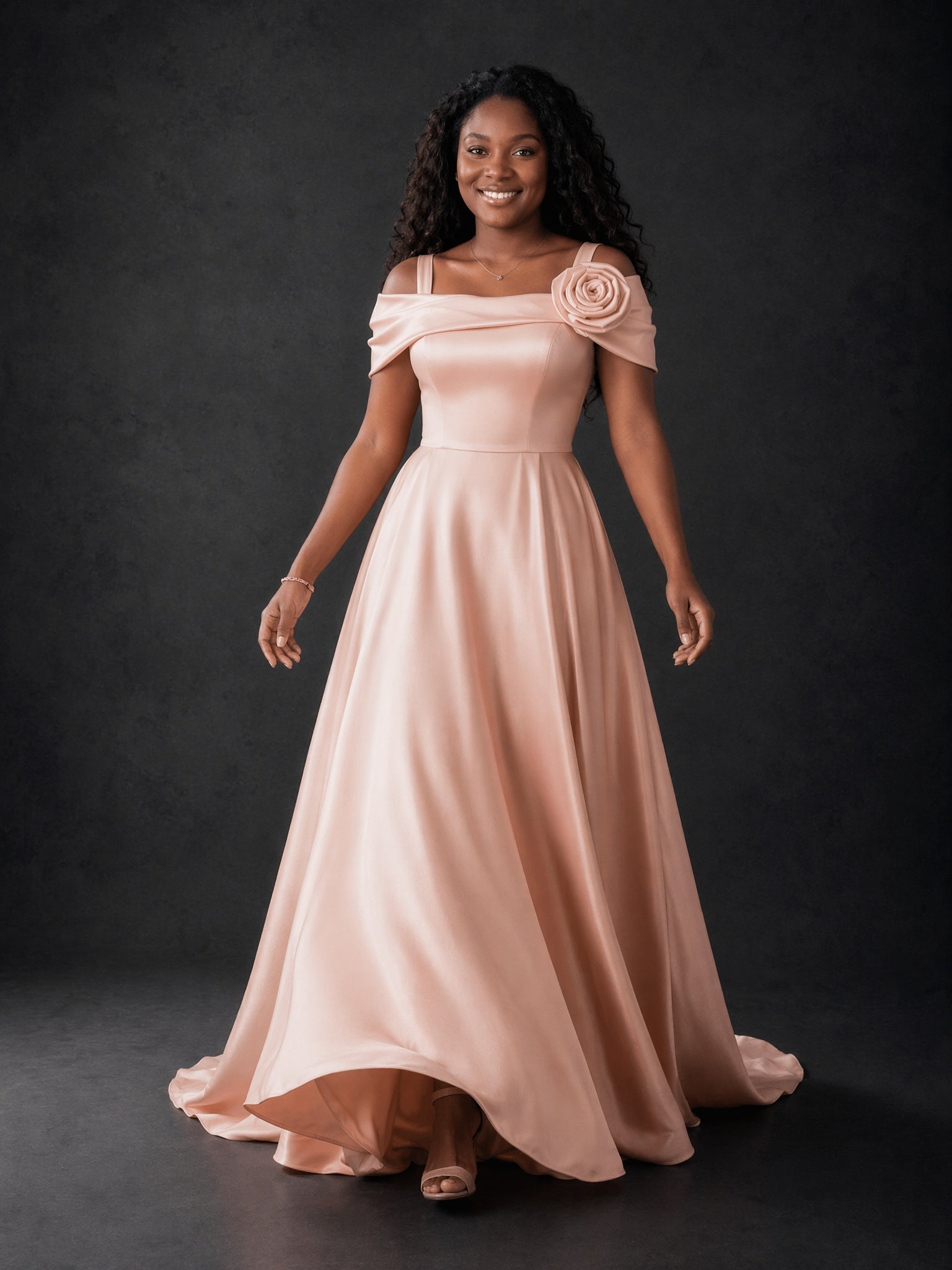BOLODOO blush pink off-shoulder satin maxi dress with 3D rose - front full length smiling pose