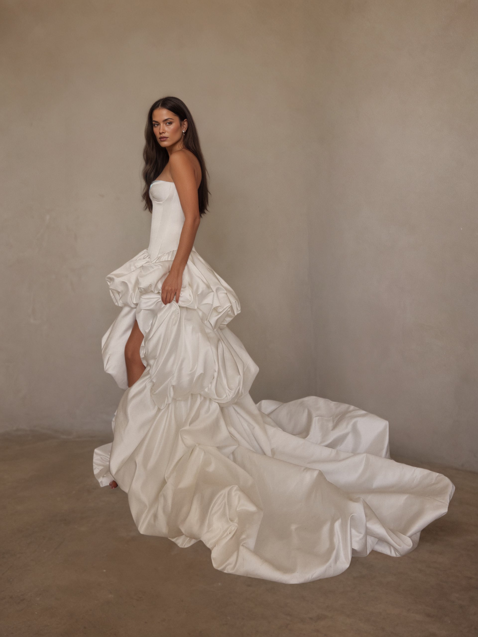 BOLODOO Ivory Strapless Sweetheart Boned Corset Satin Sculptural Ruffle Ball Gown - side view with train