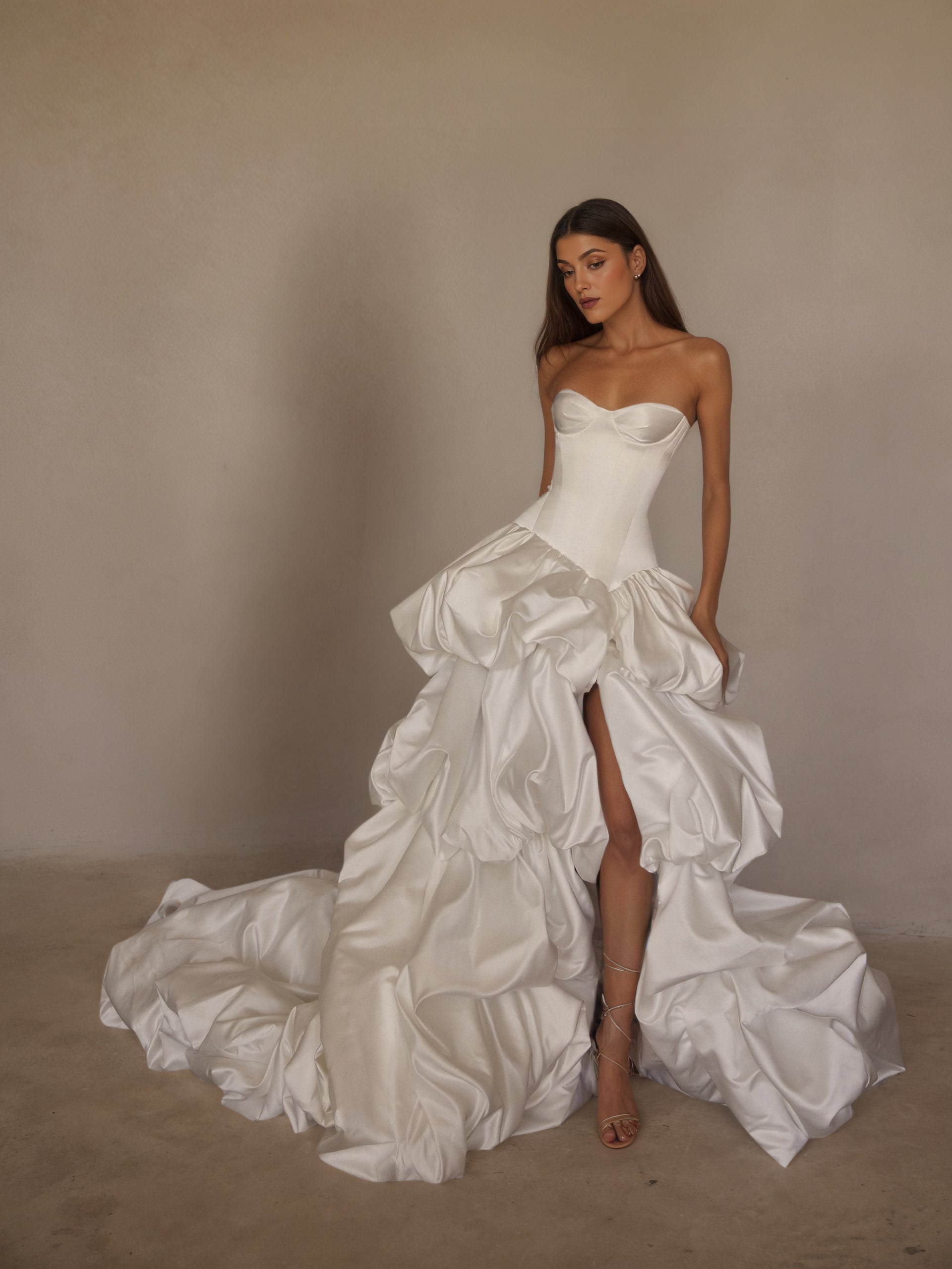 BOLODOO Ivory Strapless Sweetheart Boned Corset Satin Sculptural Ruffle Ball Gown - full front view with slit and train