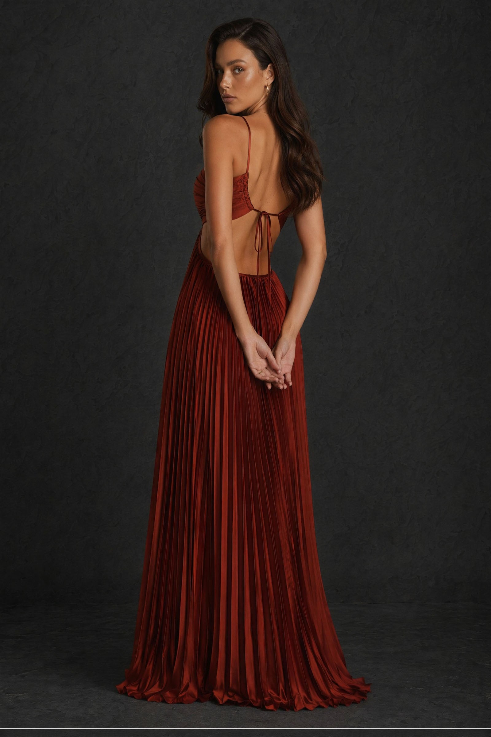 BOLODOO rust red metallic pleated halter sweetheart cutout waist A-line backless maxi dress - back view showing open tie-back