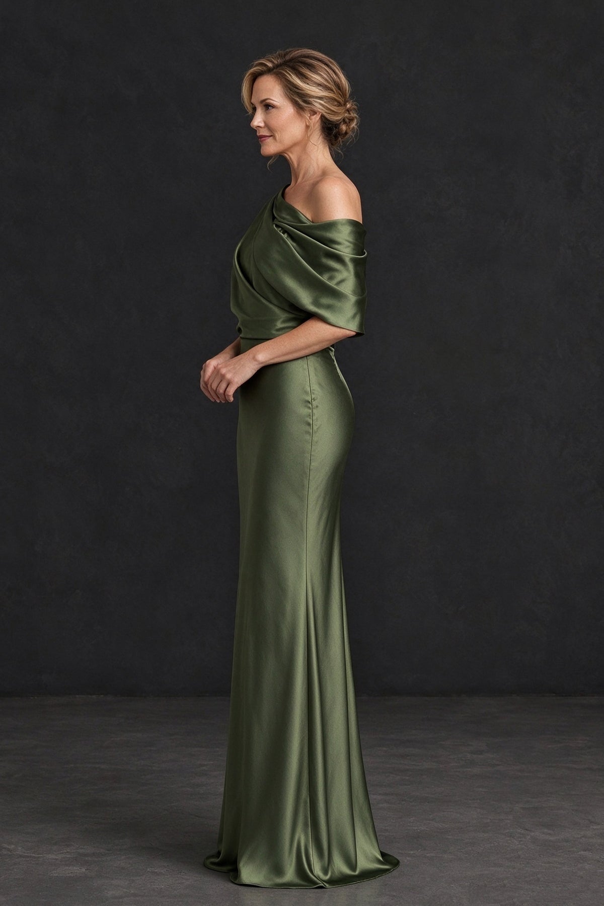 Side view of BOLODOO olive green satin dress showing exposed shoulder and fitted waist