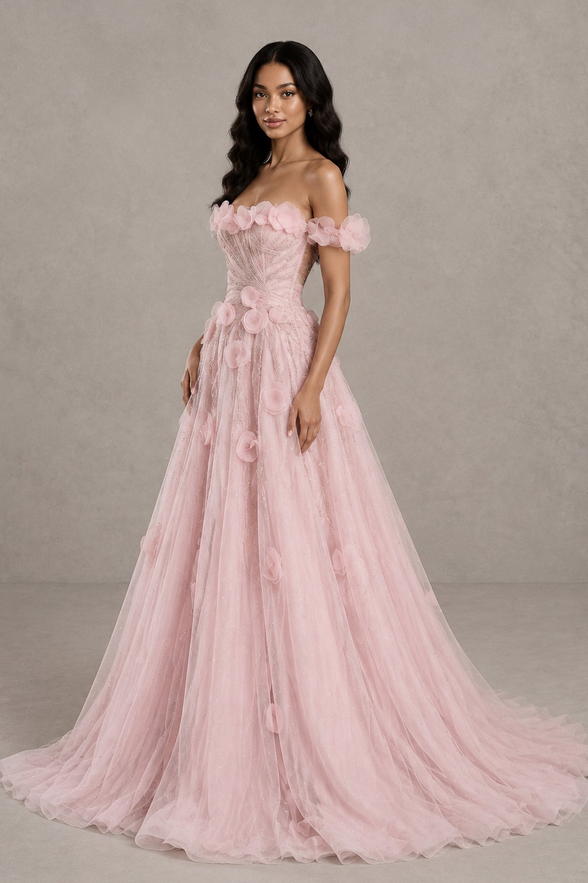 Three-quarter view of BOLODOO blush pink petal applique prom dress with full skirt and sweep train