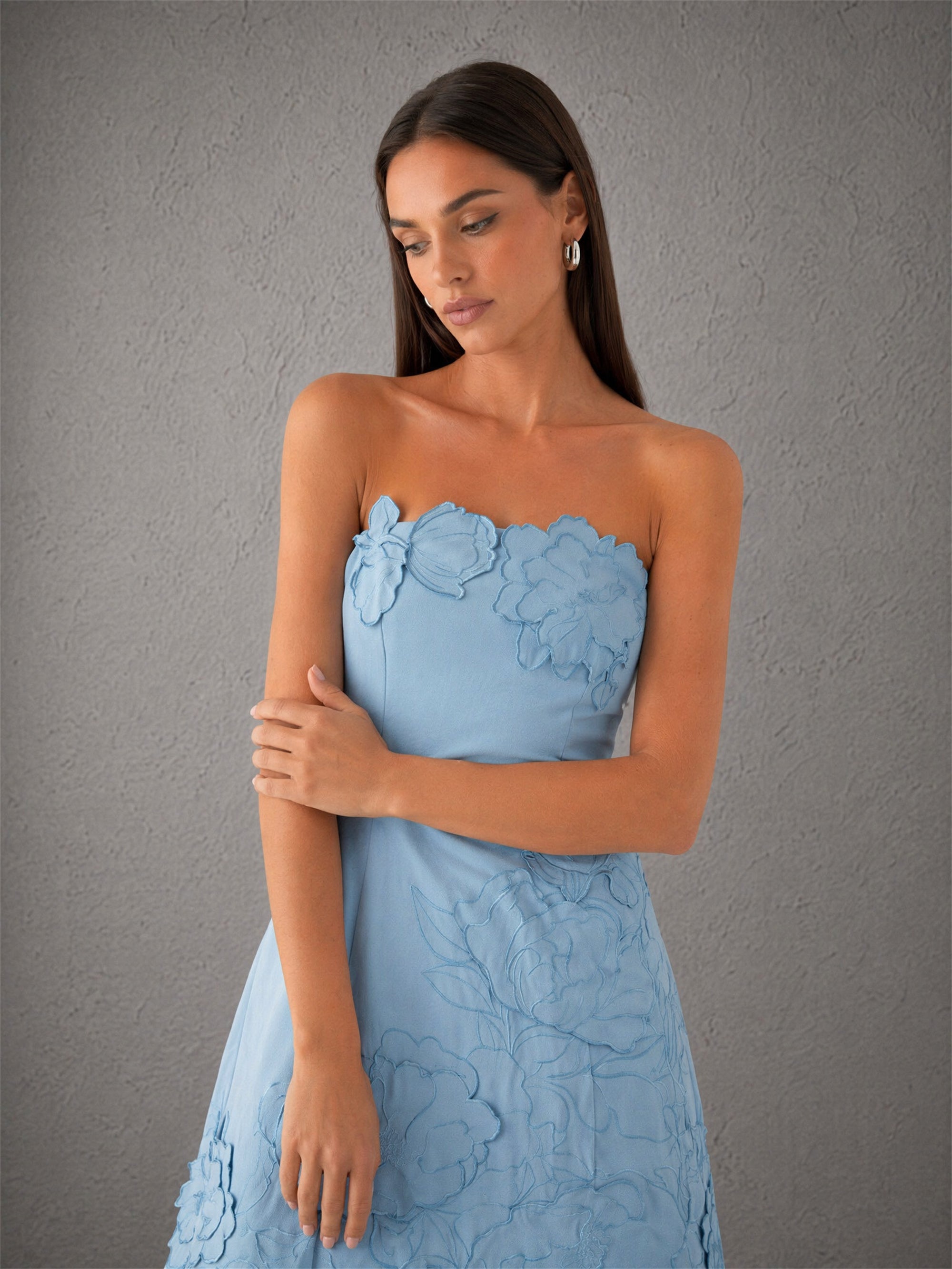 BOLODOO sky blue 3D floral lace mini dress - front three-quarter view showing dimensional flower appliqués and scalloped petal hem detail