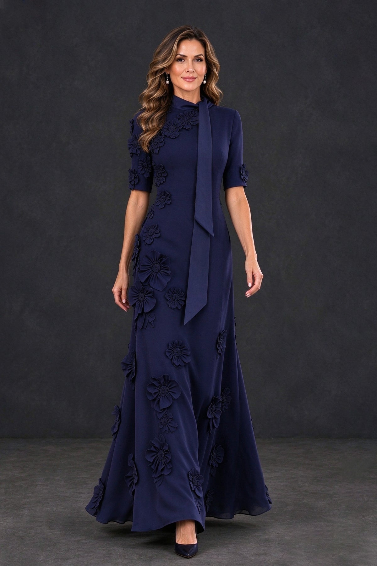 BOLODOO XX123 navy floral applique mother-of-the-bride gown in motion showing the flared skirt