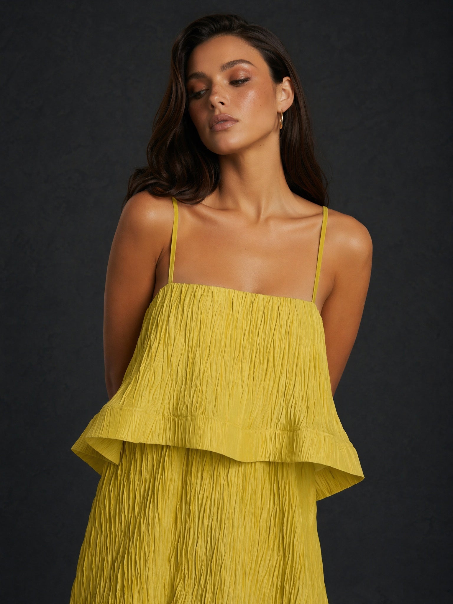 BOLODOO chartreuse yellow crinkle spaghetti strap tiered ruffle A-line backless maxi dress - close up bodice and neckline detail