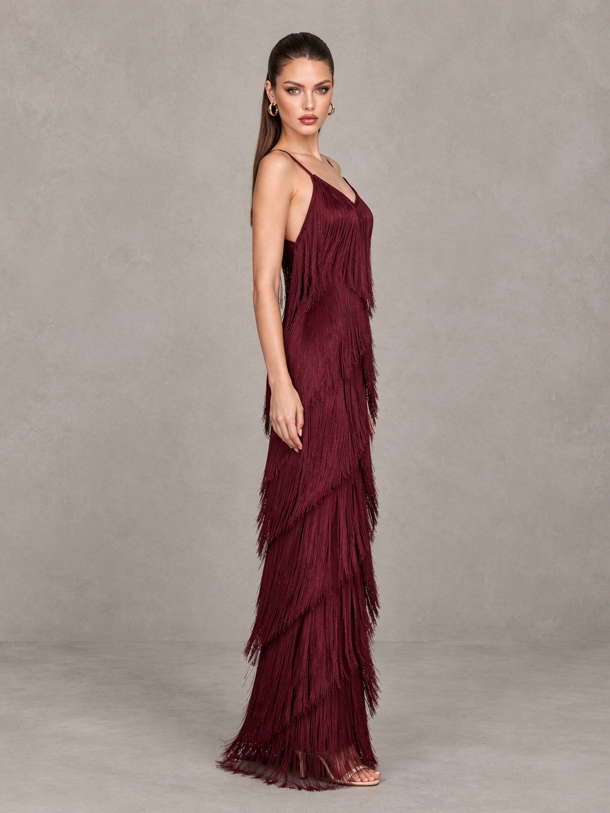 Back view of BOLODOO burgundy fringe maxi dress showing spaghetti straps and V-shaped open upper back