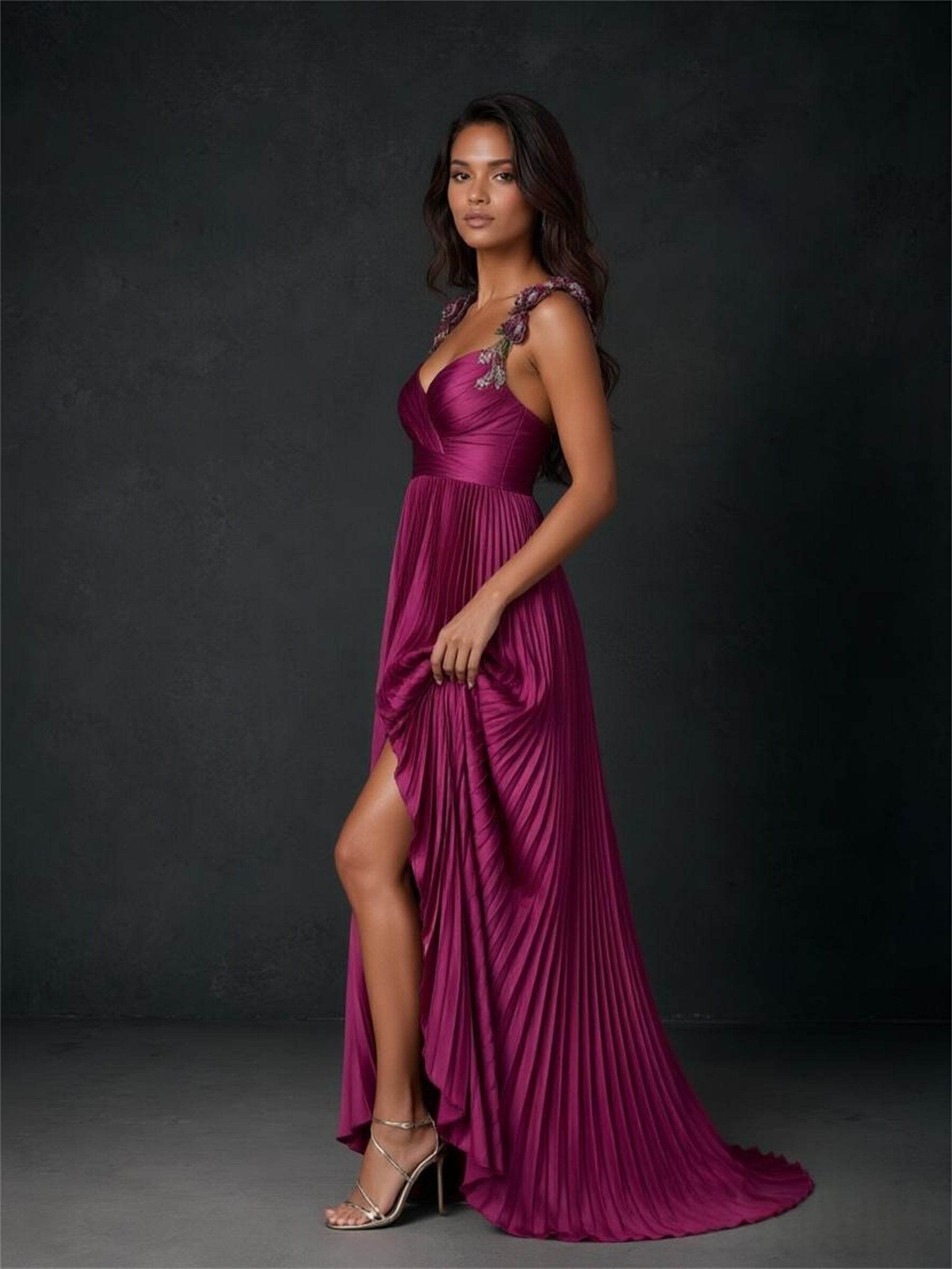BOLODOO magenta pleated chiffon gown - side view showing high side slit and flowing pleated skirt movement