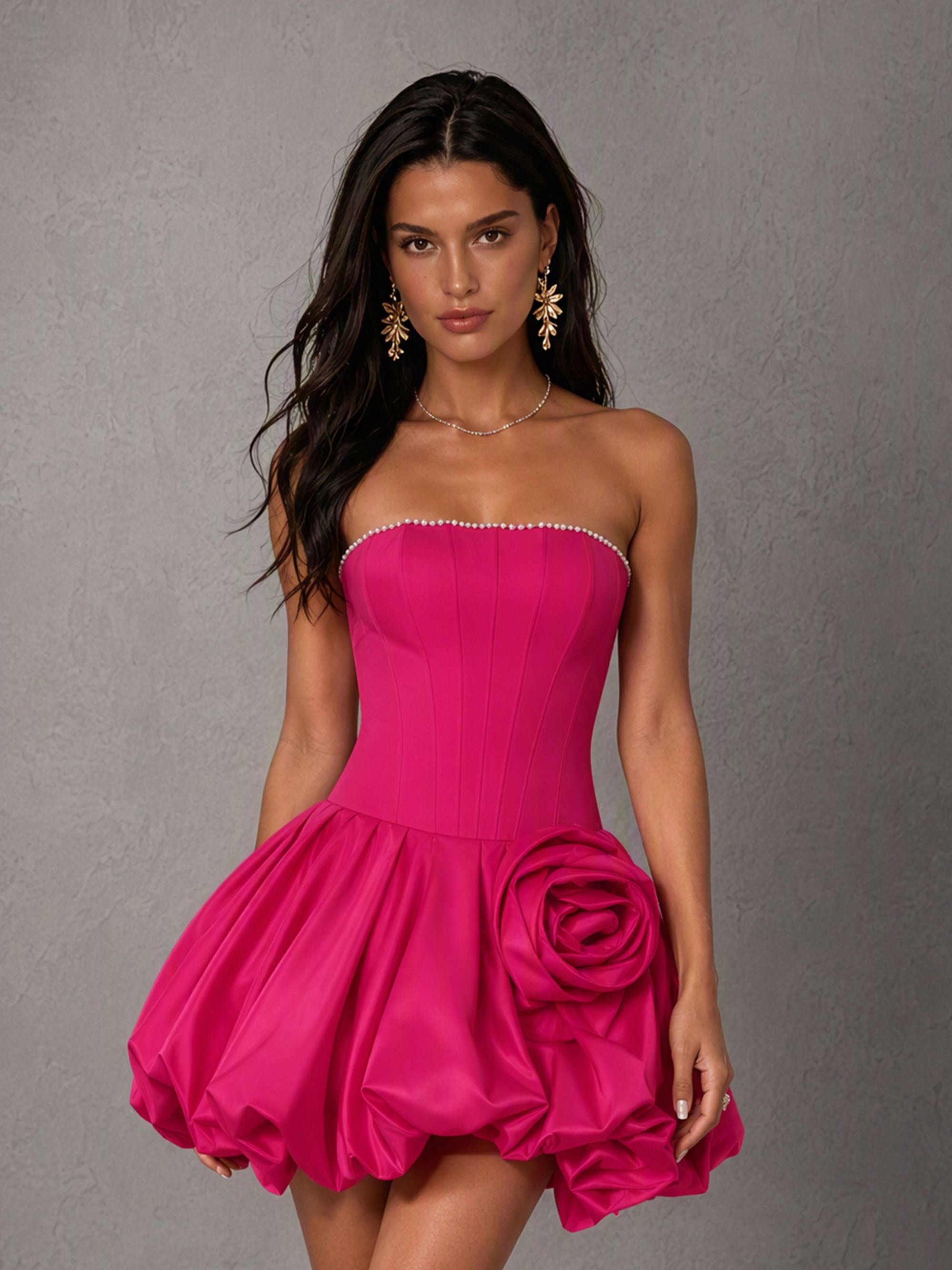 BOLODOO BD0520 Fuchsia Strapless Corset Bubble Mini Dress - Seated lifestyle shot showing full dress silhouette and bubble puff hem detail