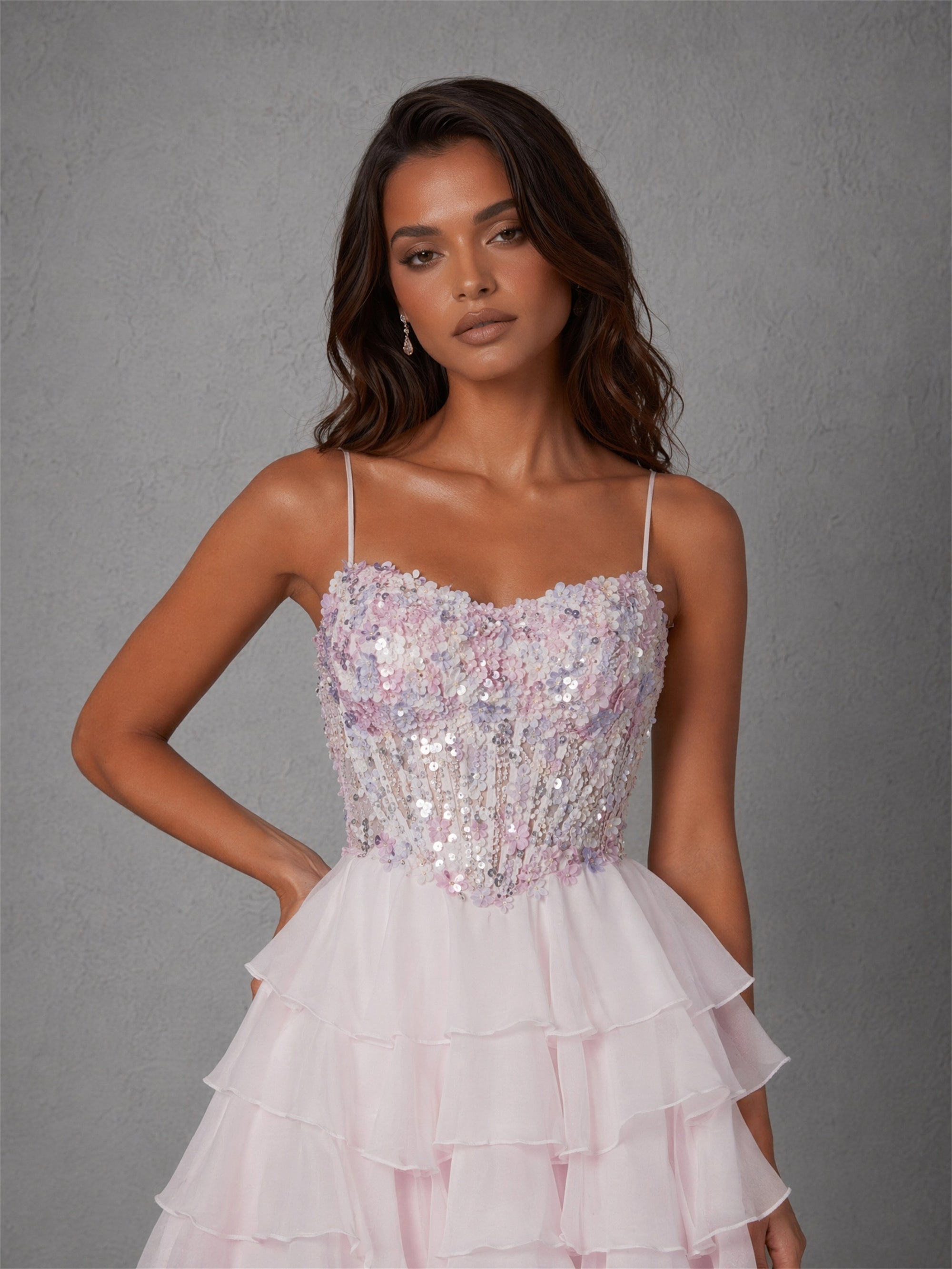 BOLODOO blush pink sequin corset tiered ruffle mini dress - back view showing lace-up criss-cross corset back and cascading organza ruffle skirt