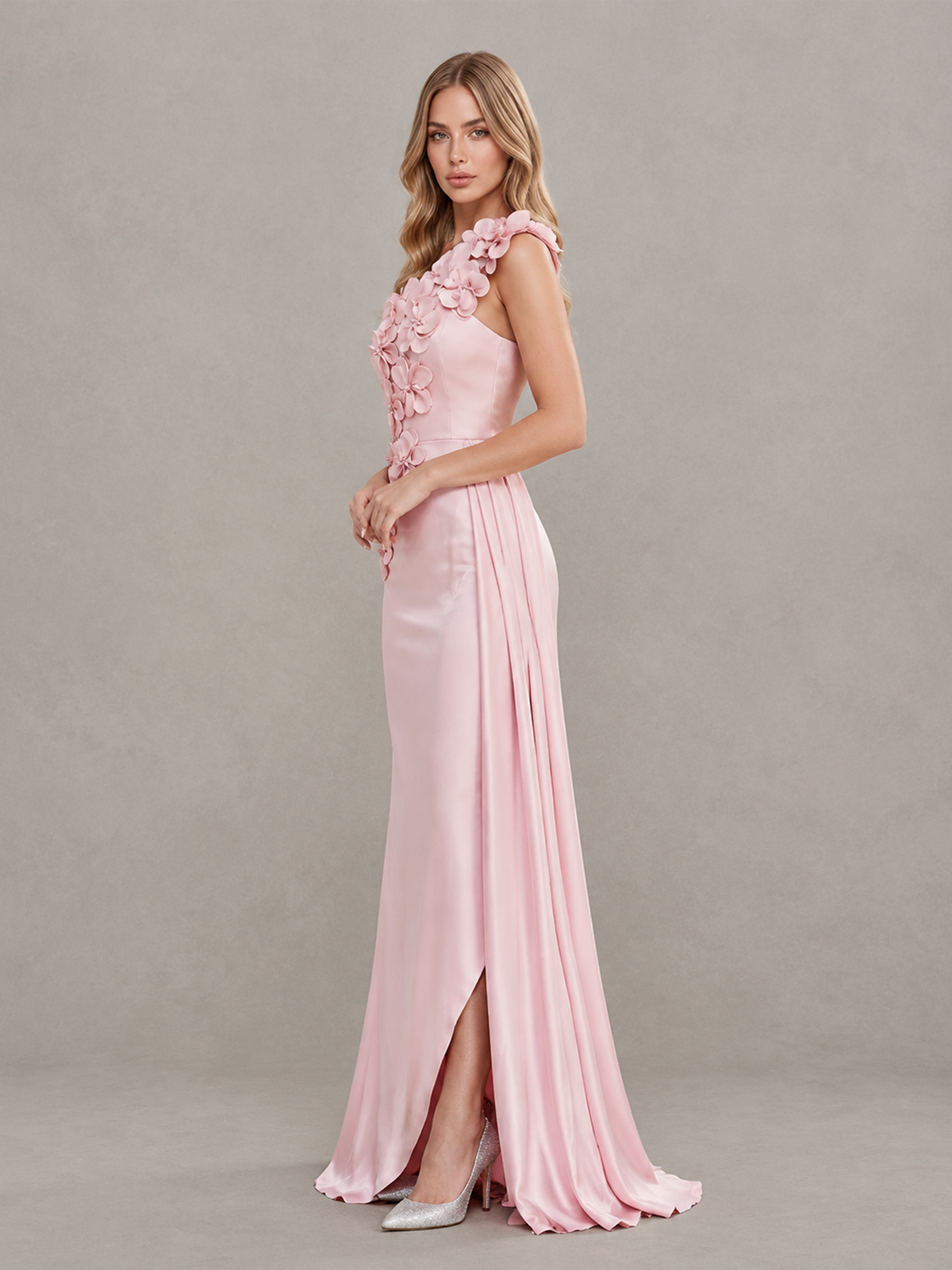 Blush pink satin evening dress with pleated side drape and front slit, side view