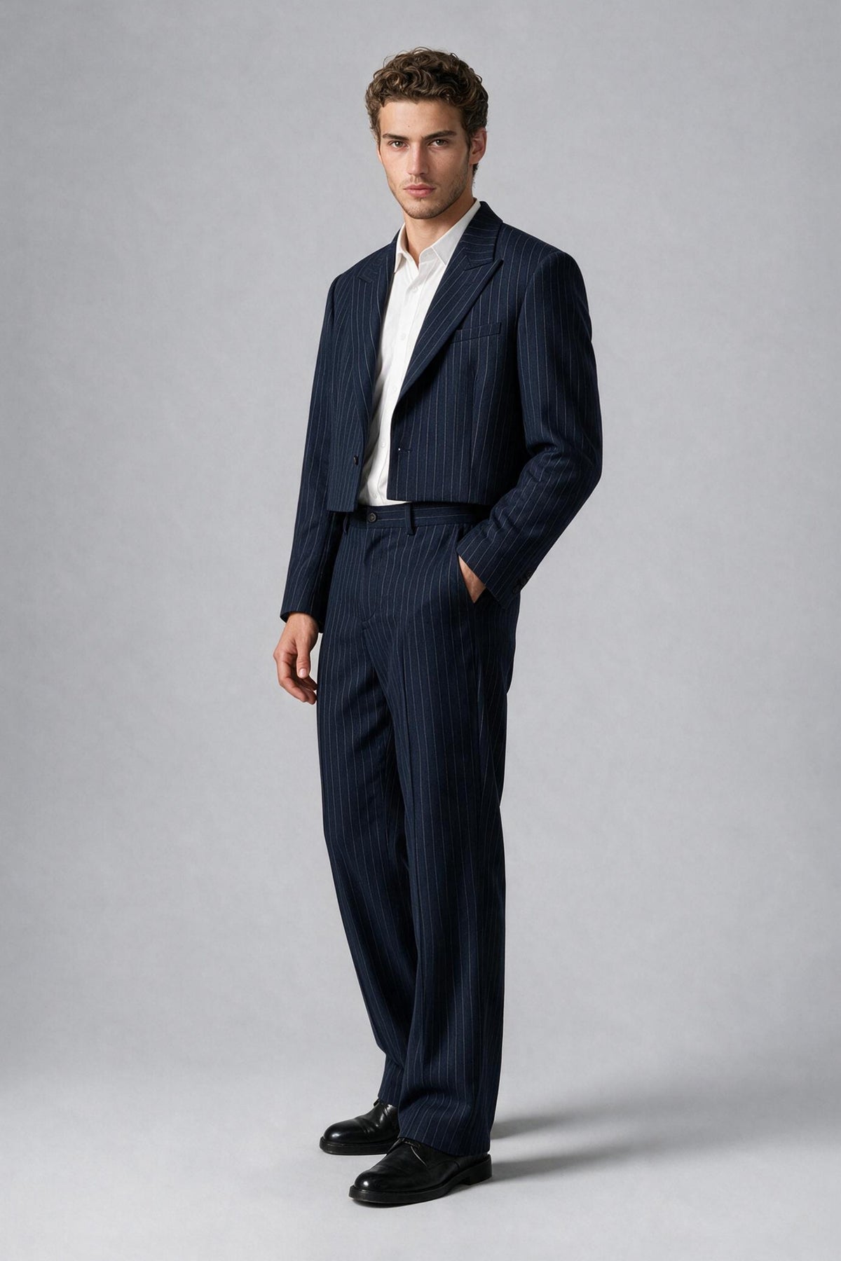 Bolodoo FQ1021 cropped navy pinstripe blazer with long sleeves, notch lapels and single-button front