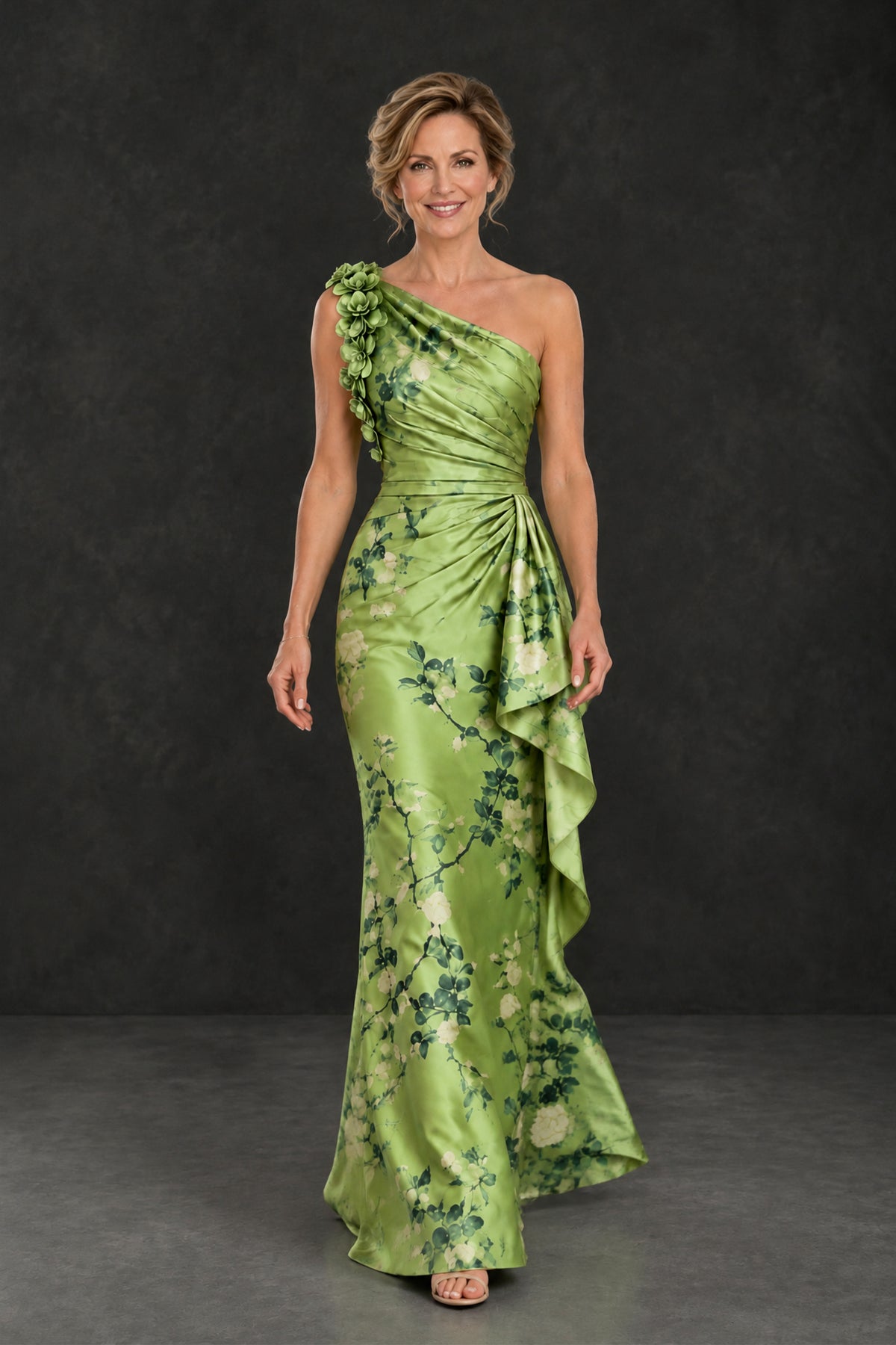 BOLODOO green floral floor-length gown with ruched bodice and cascading side drape, front walking view