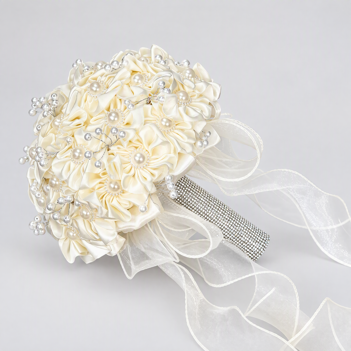 BOLODOO EE0002 ivory bridal bouquet with pearl-style beads, sparkling handle and sheer ribbon tails on a neutral background