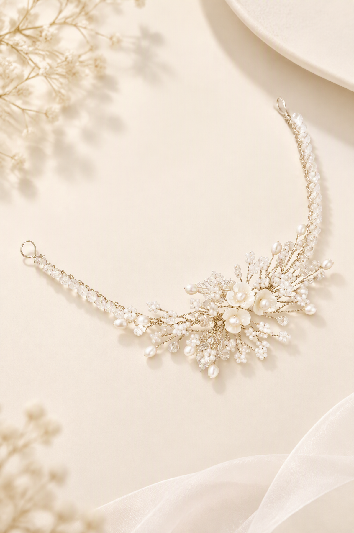 BOLODOO floral bridal bracelet with white flowers and branching bead details on a soft ivory background