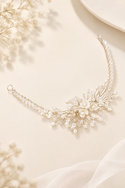 BOLODOO floral bridal bracelet with white flowers and branching bead details on a soft ivory background