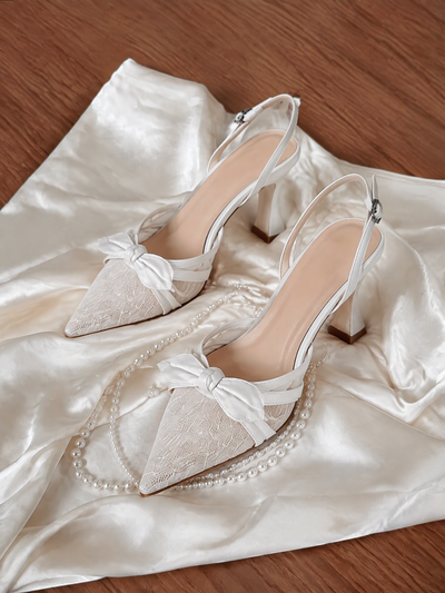 BOLODOO XCD009 white lace bow bridal shoes with pointed toes, buckle straps and 8.5 cm heels, full pair view