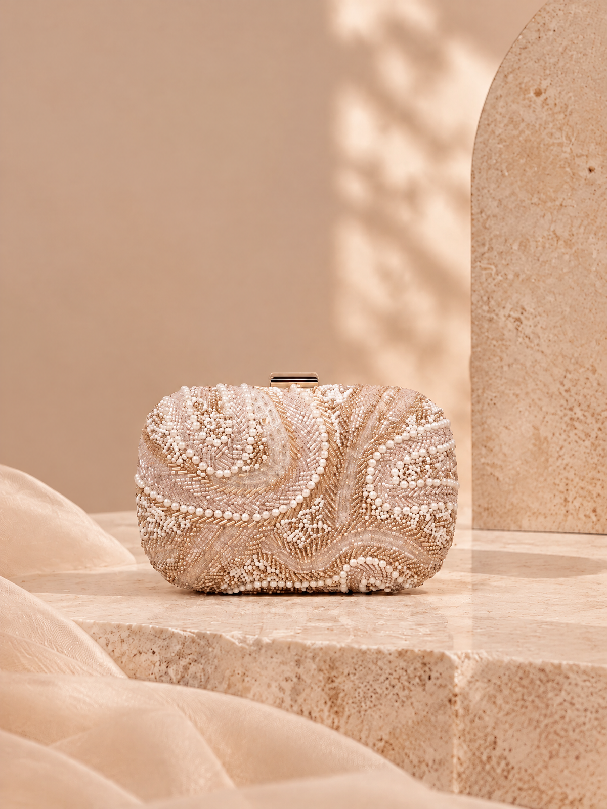 BOLODOO XCD062 champagne gold beaded evening clutch, front view with ivory pearl-look swirl decoration