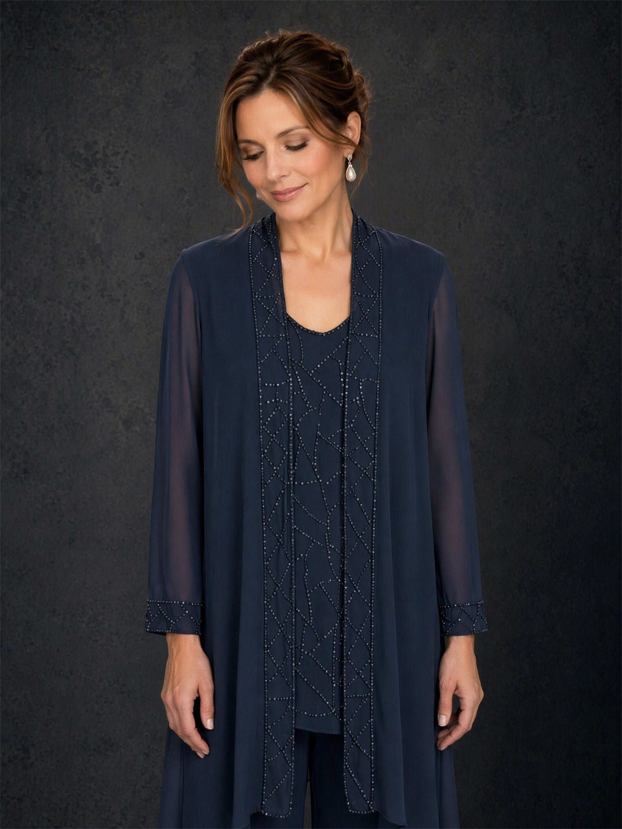 BOLODOO navy blue beaded chiffon duster pant suit - front close-up showing scoop neck beaded top, open jacket lapel and geometric lattice beading pattern