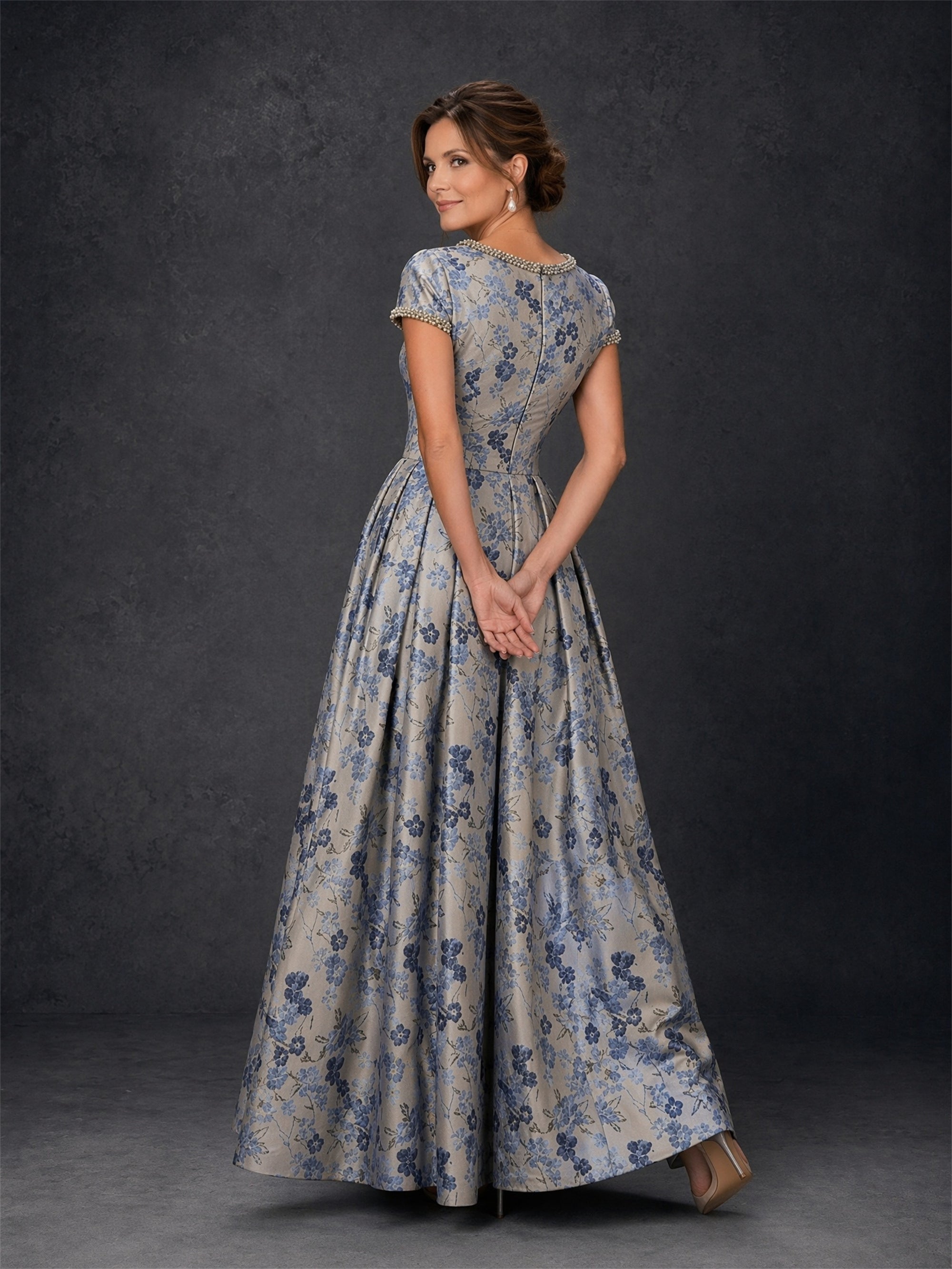 BOLODOO blue floral jacquard ball gown - close-up detail of pearl beaded neckline and short sleeve cuffs