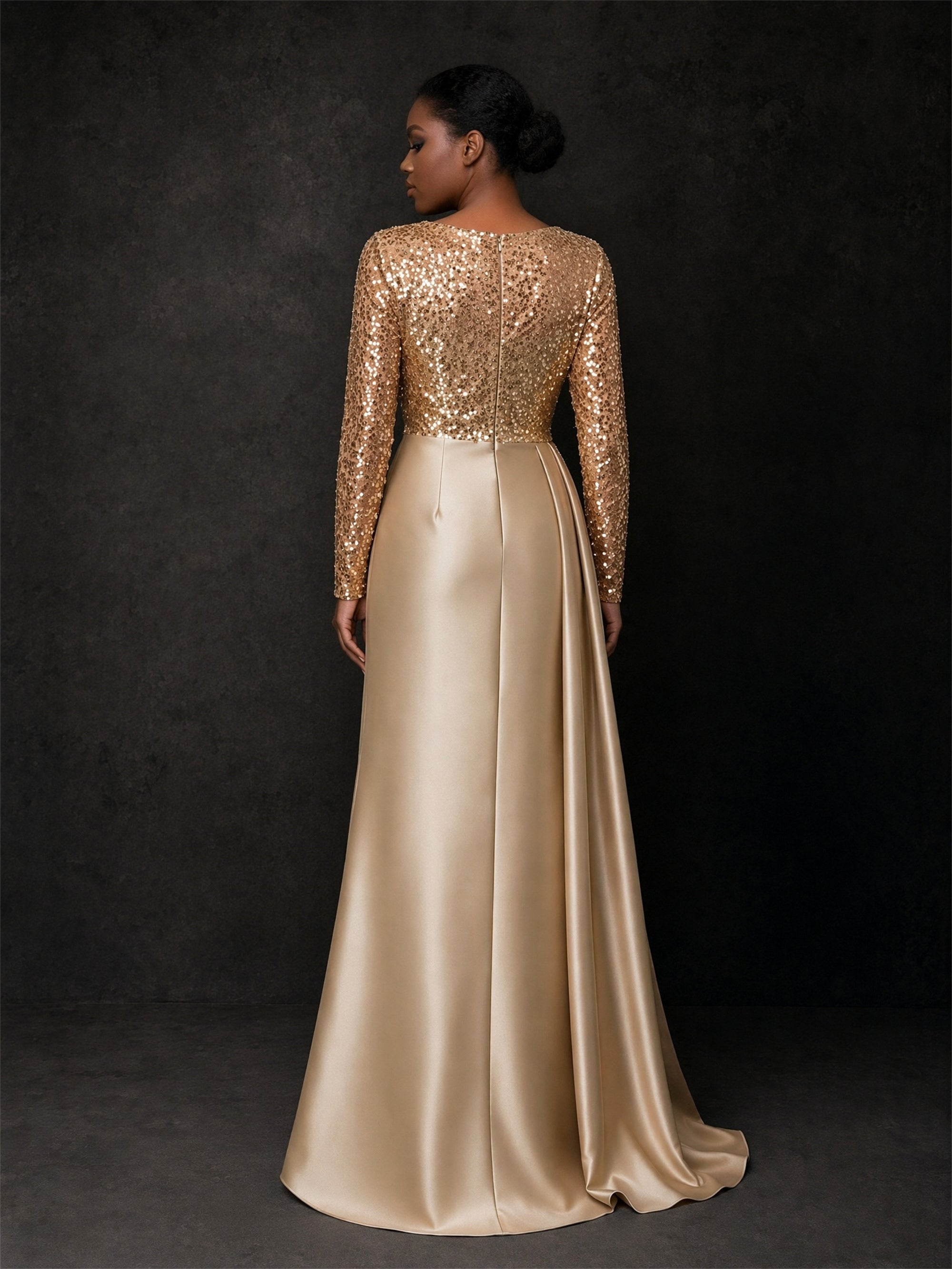 BOLODOO BD0371 gold sequin long sleeve satin evening gown - front full-length view showing A-line silhouette and crystal leaf appliqué at hip