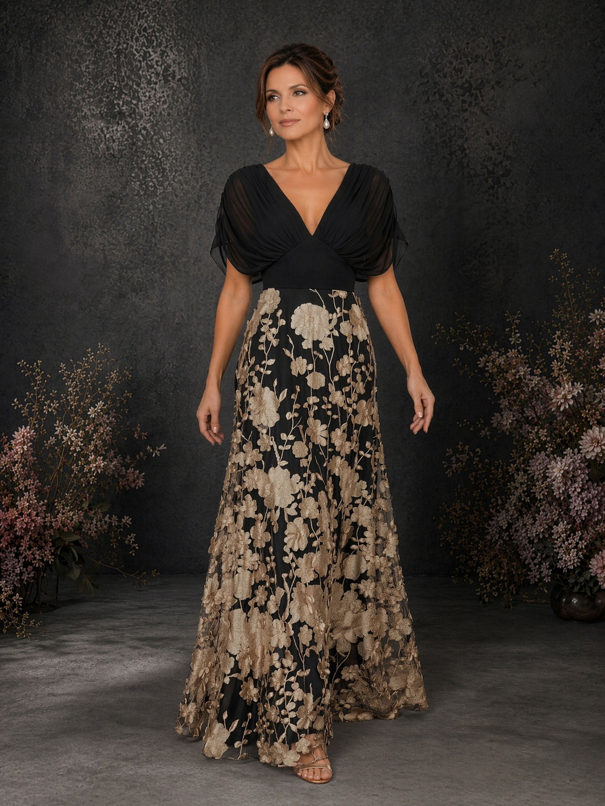 BOLODOO BD0414 black and champagne gold chiffon V-neck gown – second front view highlighting empire waist and champagne gold 3D floral embroidery on black lace skirt
