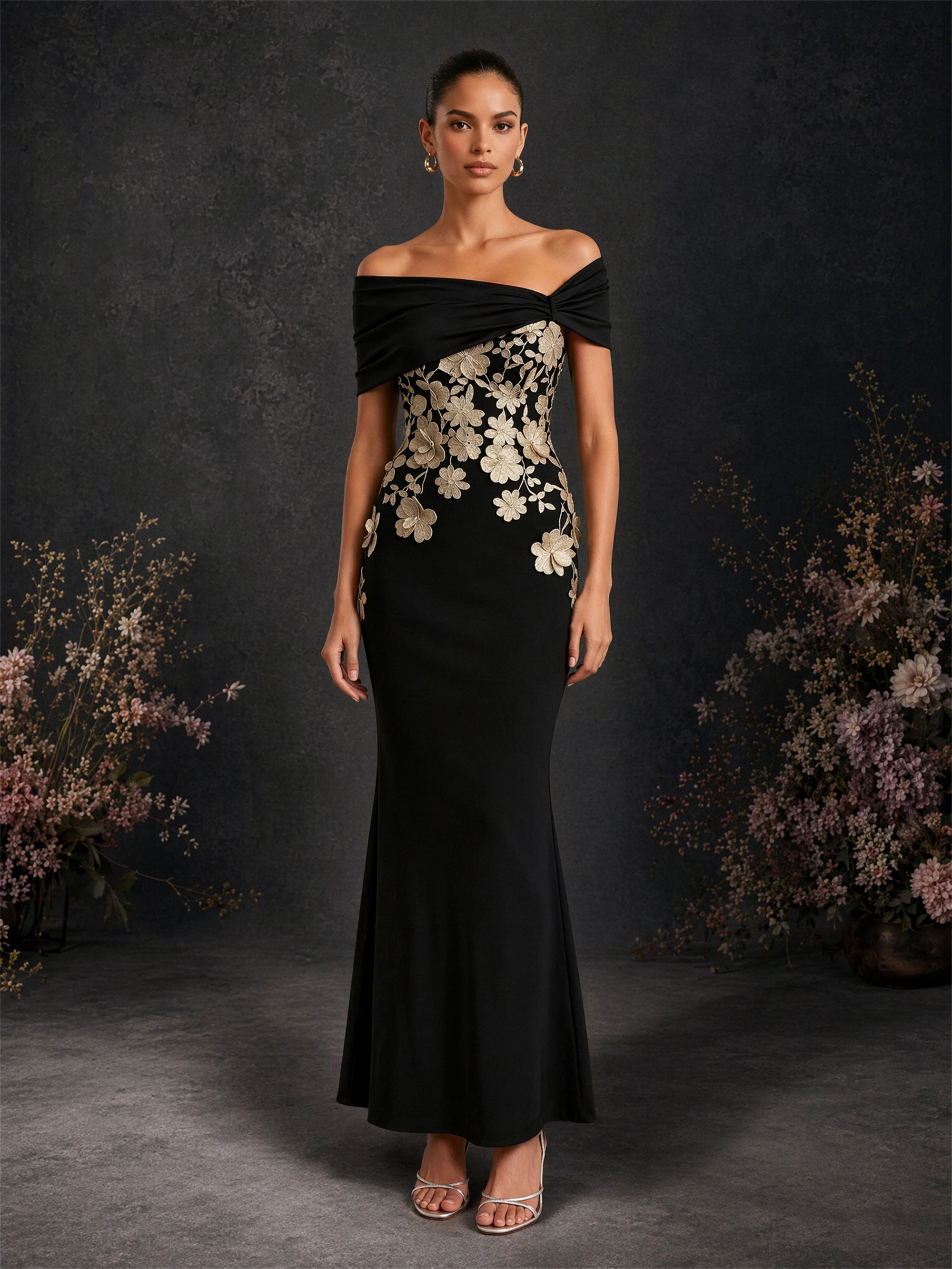 BOLODOO BD0420 black and gold off-shoulder twisted neckline gold floral appliqué mermaid floor-length gown – front view showing twisted off-shoulder neckline and cascading gold 3D floral appliques