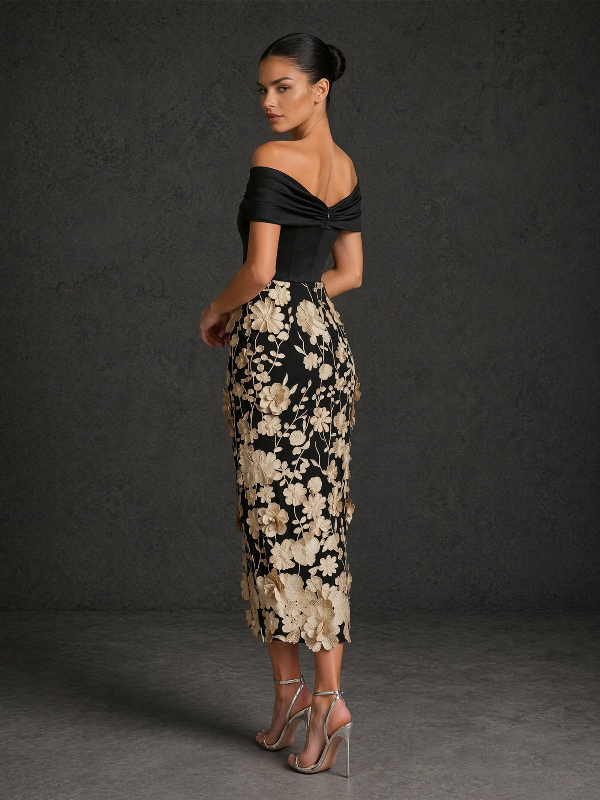 BOLODOO BD0422 black and champagne gold off-shoulder twisted V-neck 3D floral appliqué tea length dress – back view showing open back with twisted knot detail and champagne gold floral embroidered skirt