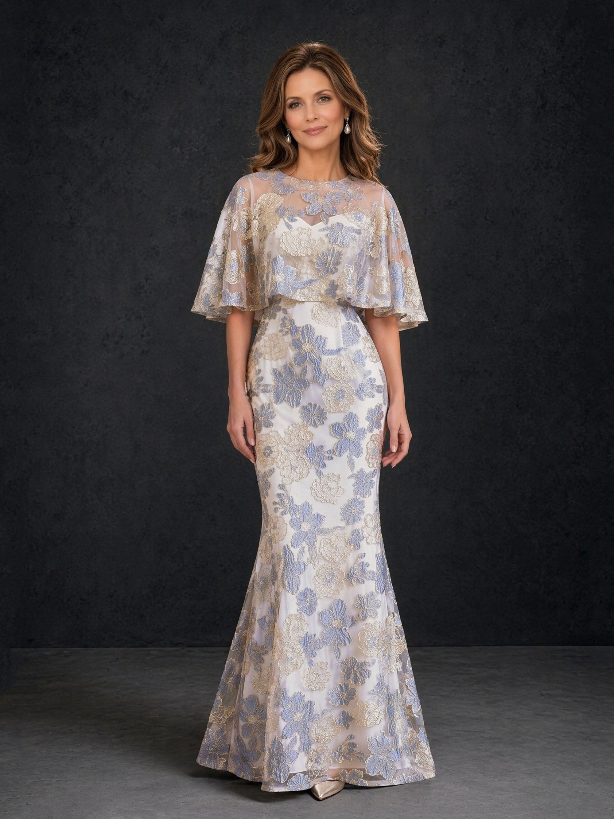 BOLODOO champagne dusty blue floral lace mermaid gown with sheer cape sleeve – back three-quarter view showing zipper closure