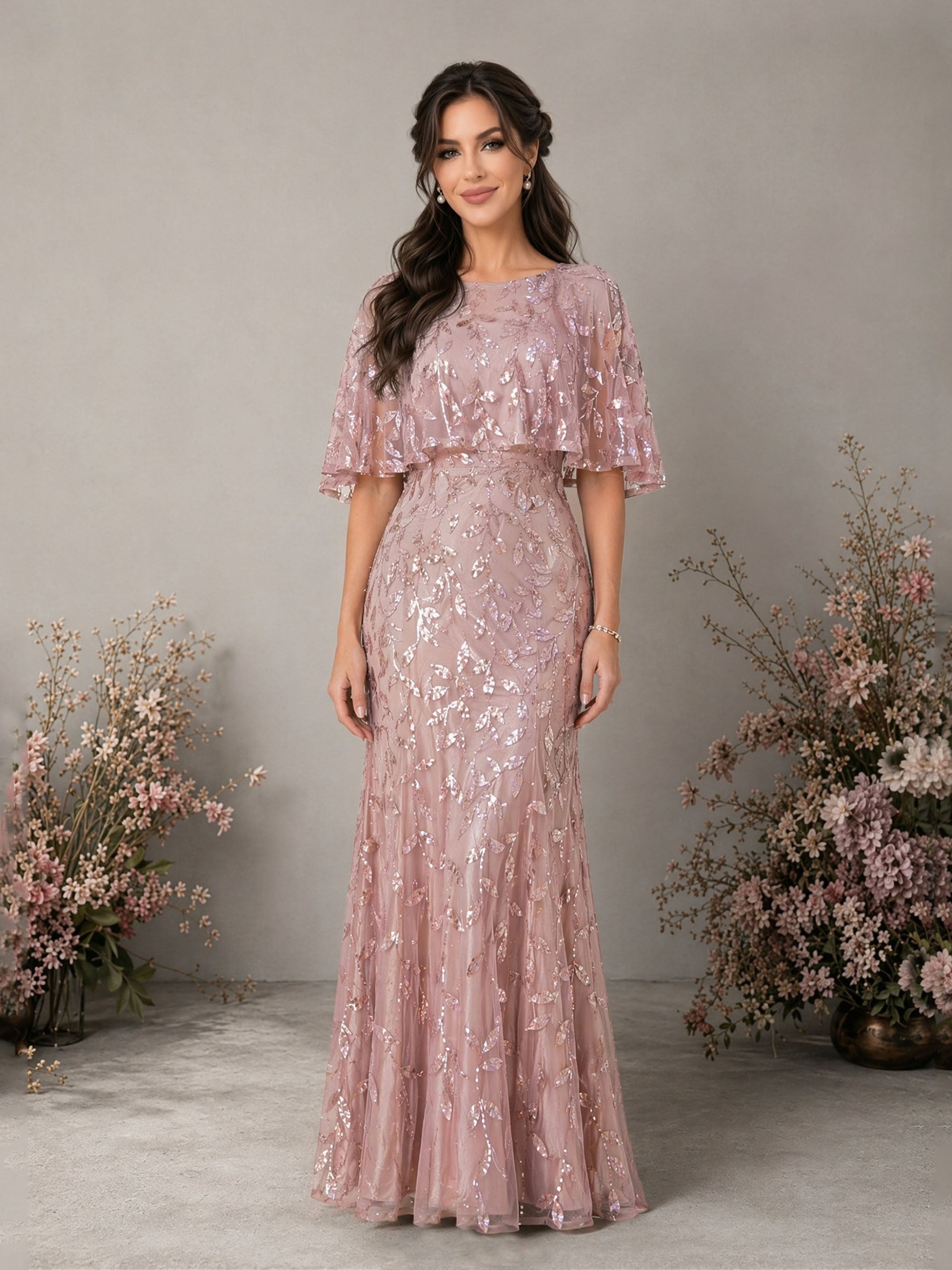 BOLODOO dusty rose sequin mermaid gown low V open back with bow tie waist and flutter cape sleeve – back three-quarter view
