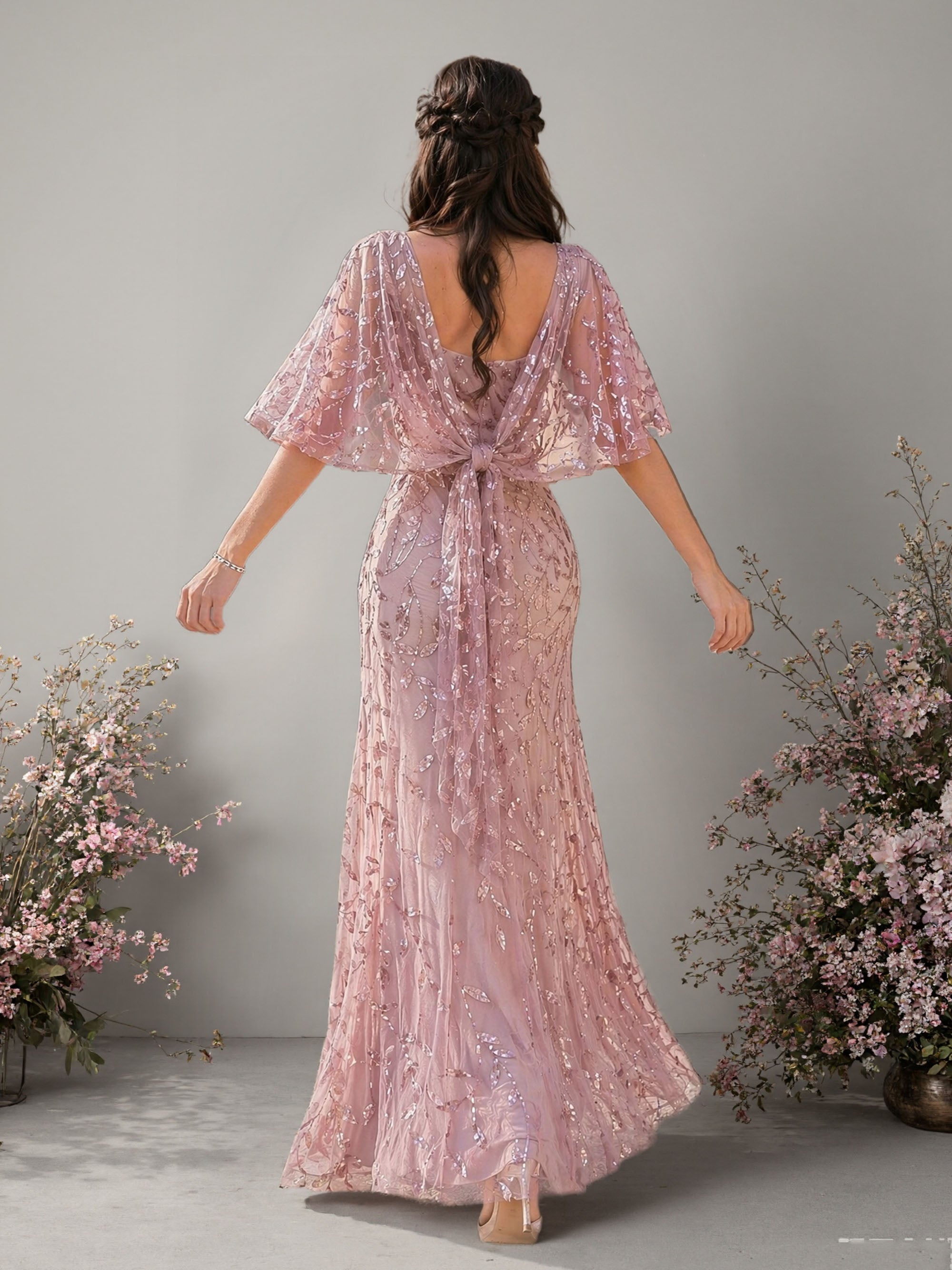 BOLODOO dusty rose sequin floral cape sleeve mermaid evening gown front view looking down showing embroidery detail and floor length hem