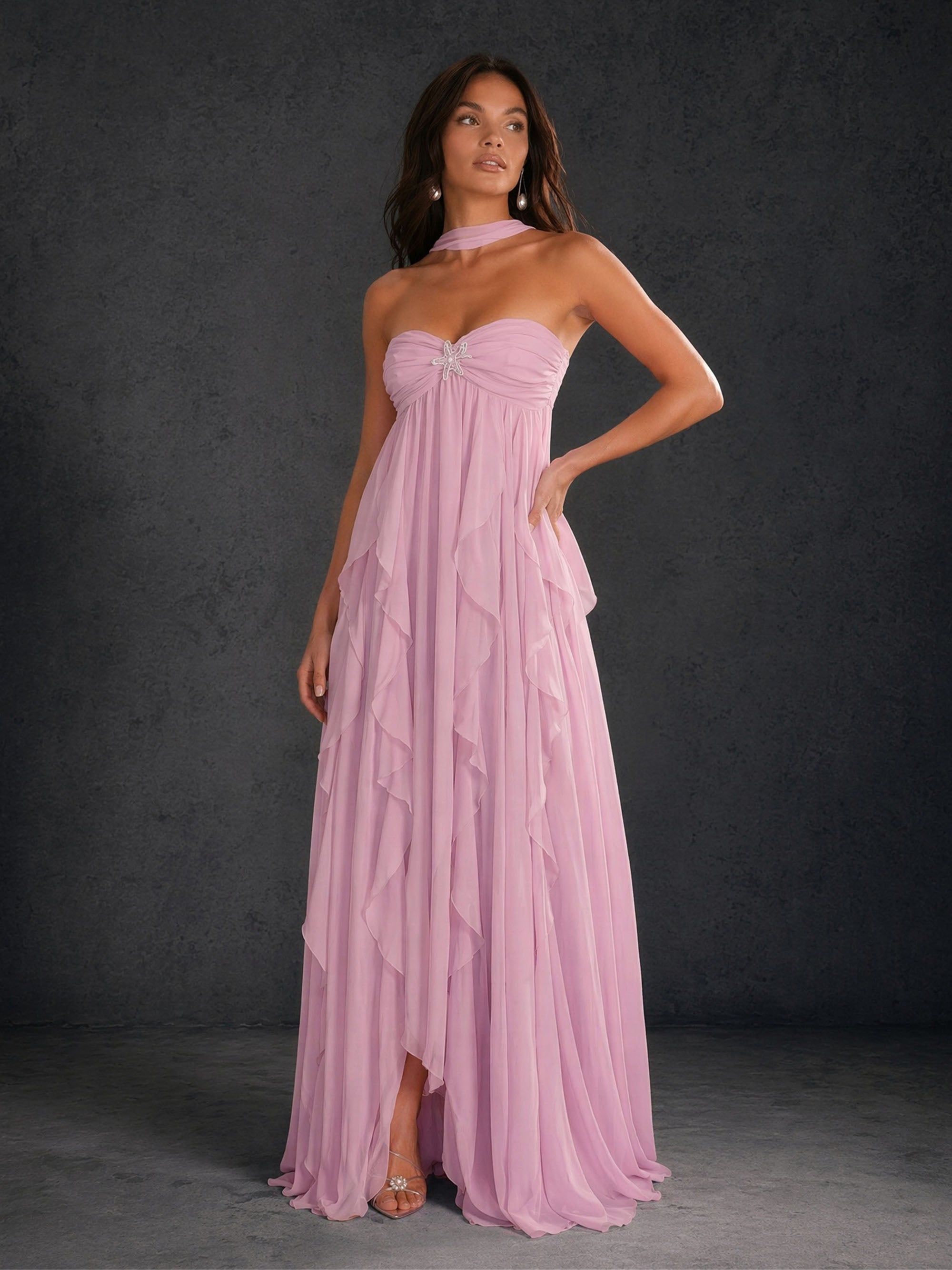 BOLODOO mauve halter neck cascading ruffle chiffon maxi dress with rhinestone butterfly brooch and hi-lo front slit – front full length arms down view