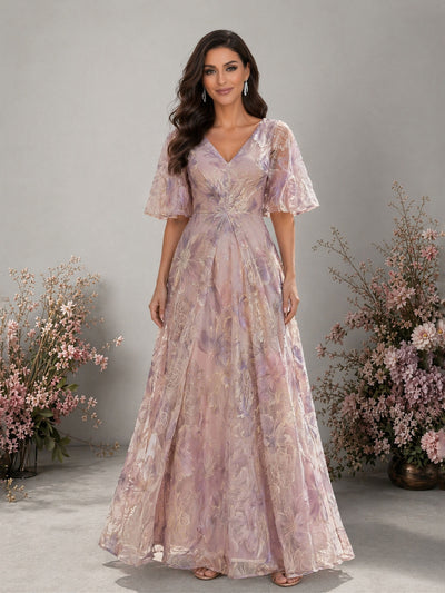 BOLODOO lavender metallic floral embroidered organza V-neck flutter sleeve empire waist A-line floor length gown – front full length smiling direct gaze view