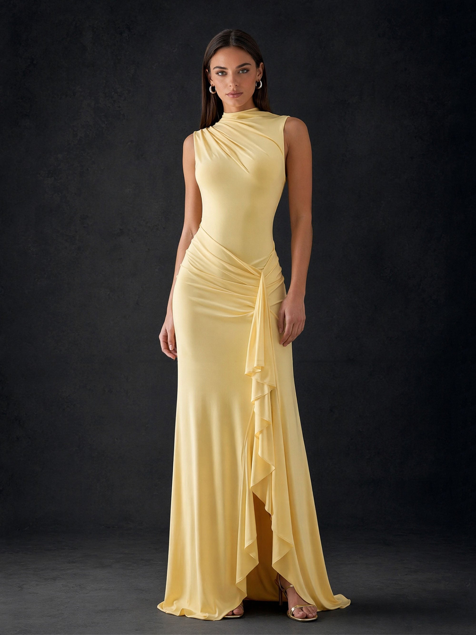BOLODOO pale yellow high neck sleeveless ruched satin cascade ruffle slit column maxi gown – front full length view