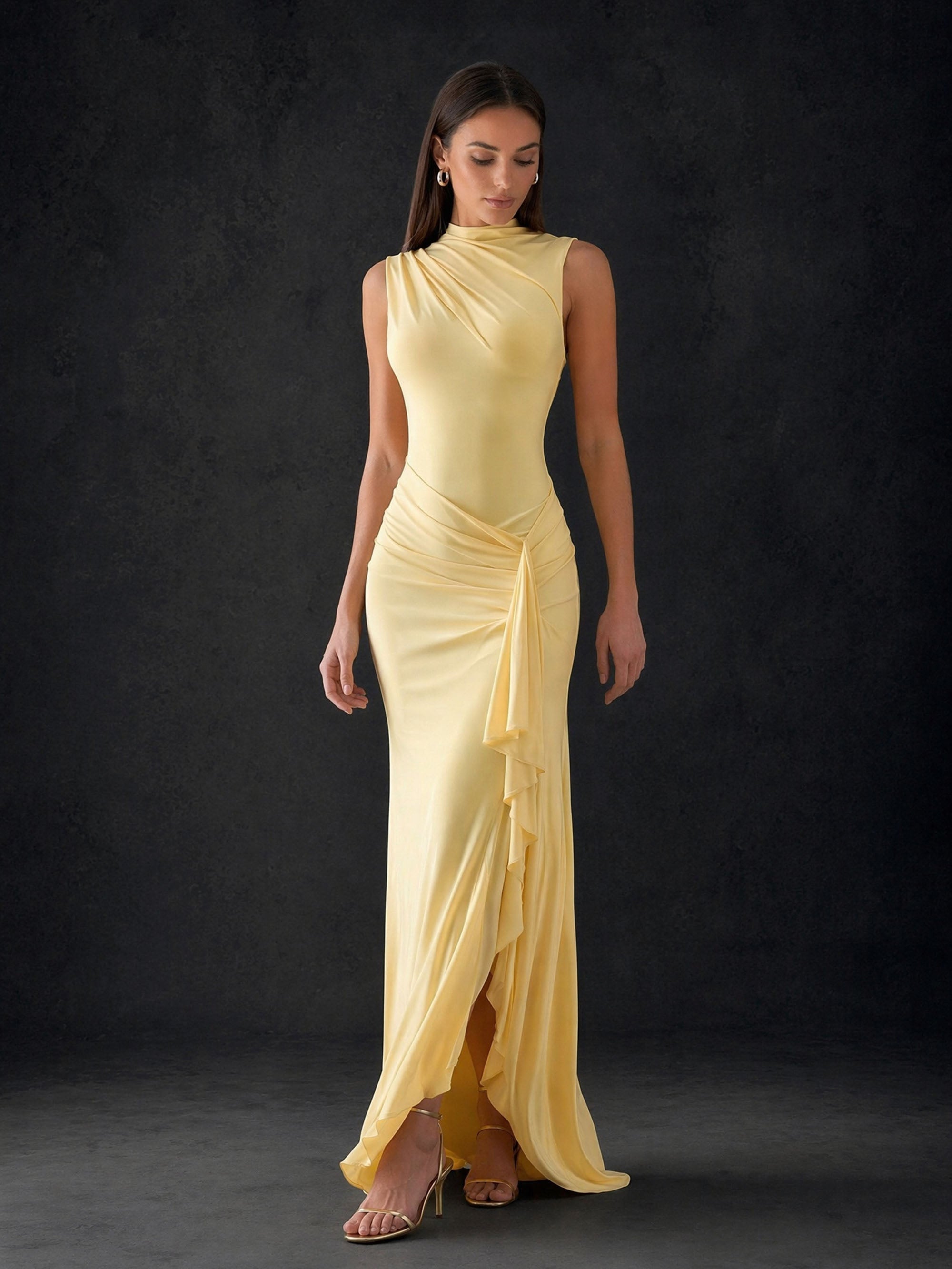 BOLODOO pale yellow ruched satin gown – front standing full length view showing cascade ruffle slit