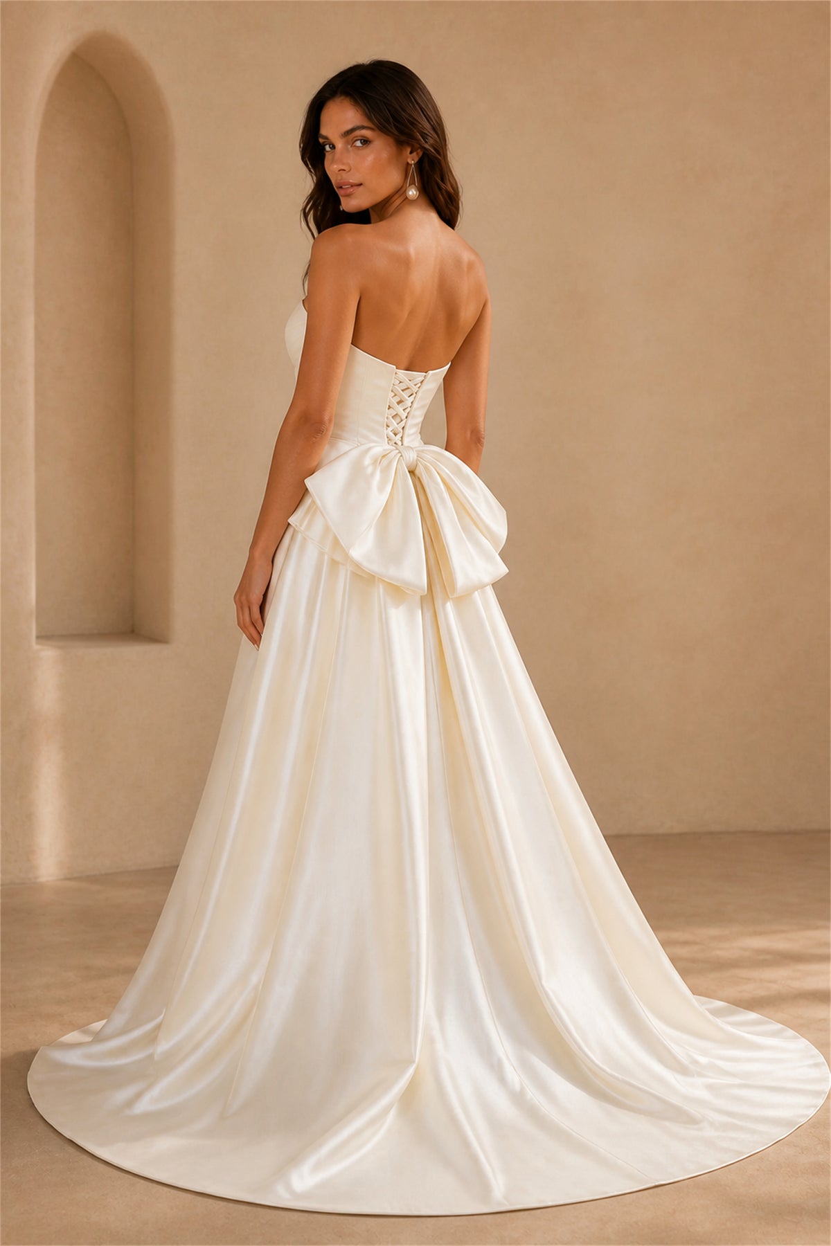 BOLODOO Ivory Satin Strapless A-Line Wedding Gown - Front View with Bow Hip Draping
