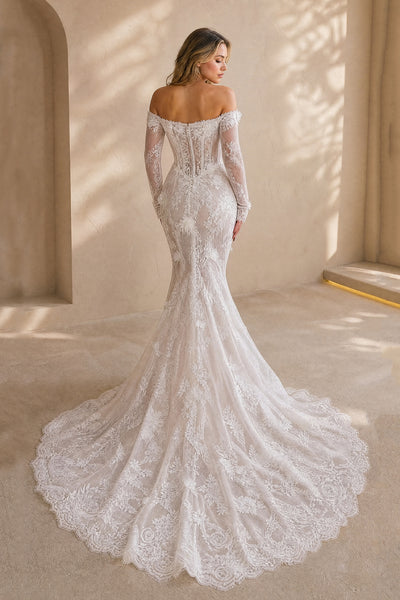 White embroidered lace mermaid wedding gown with corset back detail and scalloped train