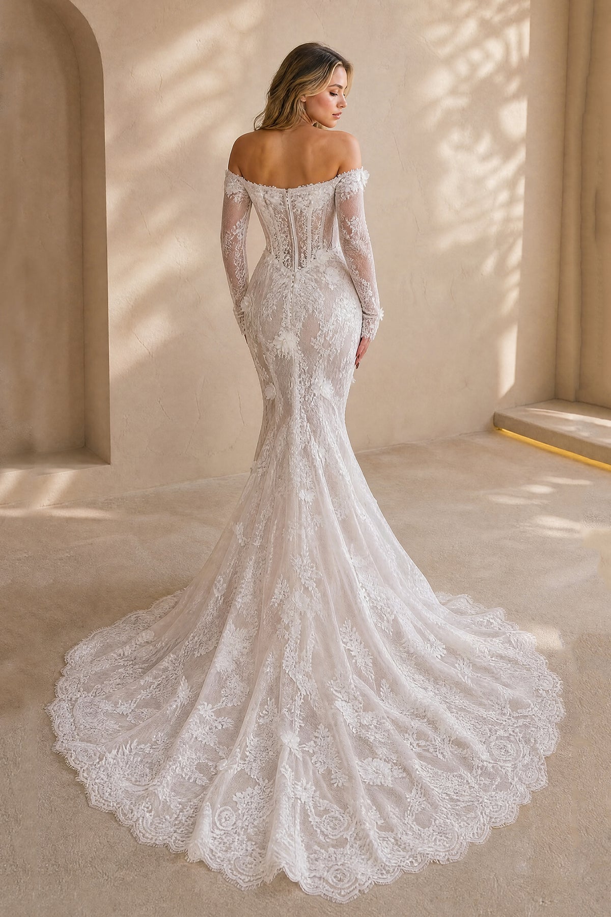 White embroidered lace mermaid wedding gown with corset back detail and scalloped train