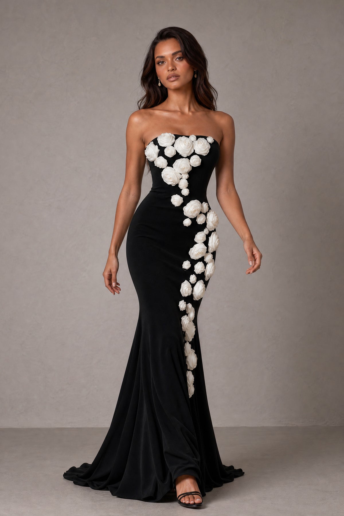 Black floor length mermaid formal dress with cascading white flower appliques and sweep train