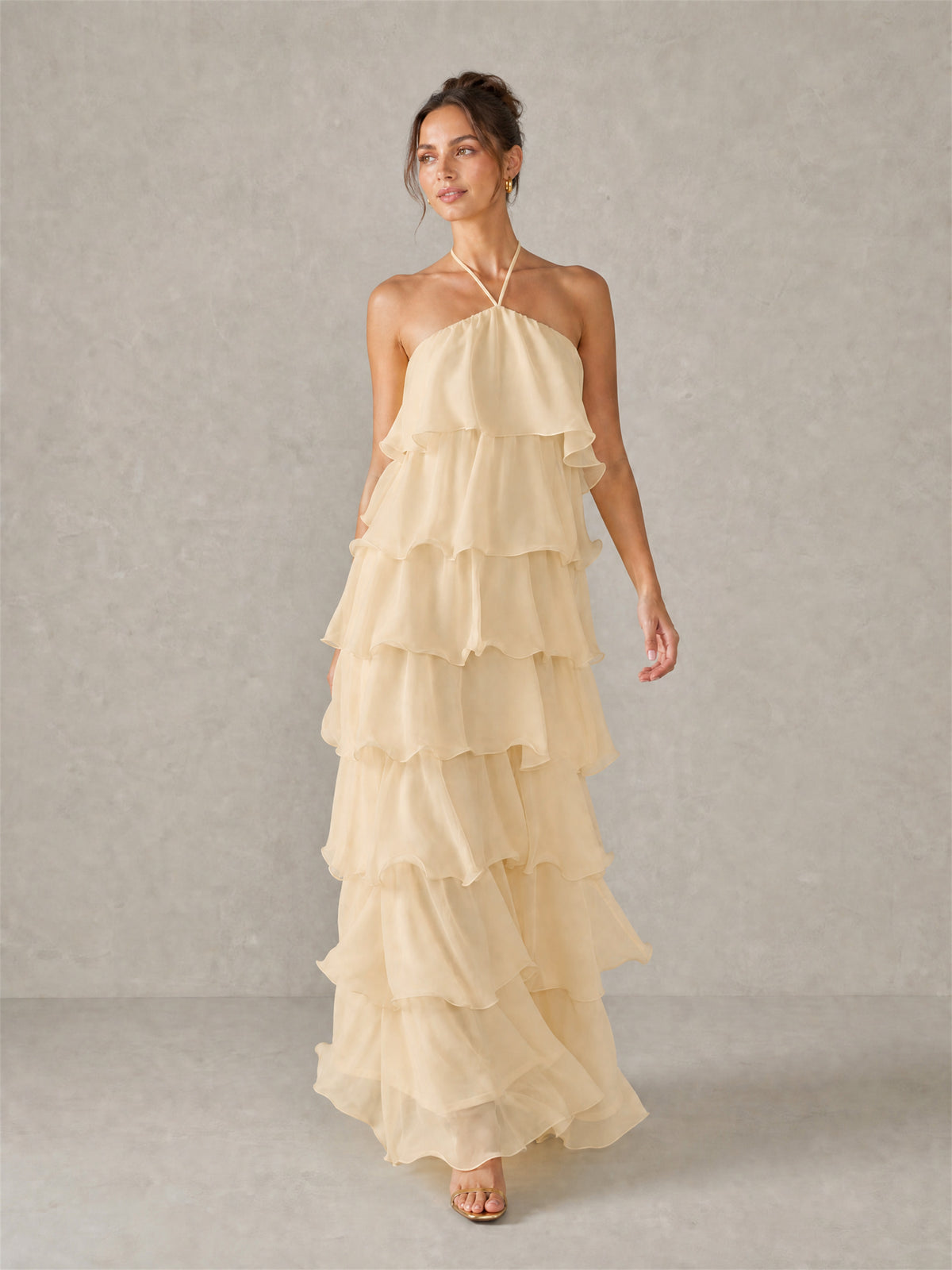 Champagne sleeveless halter chiffon floor length dress with cascading ruffle tiers