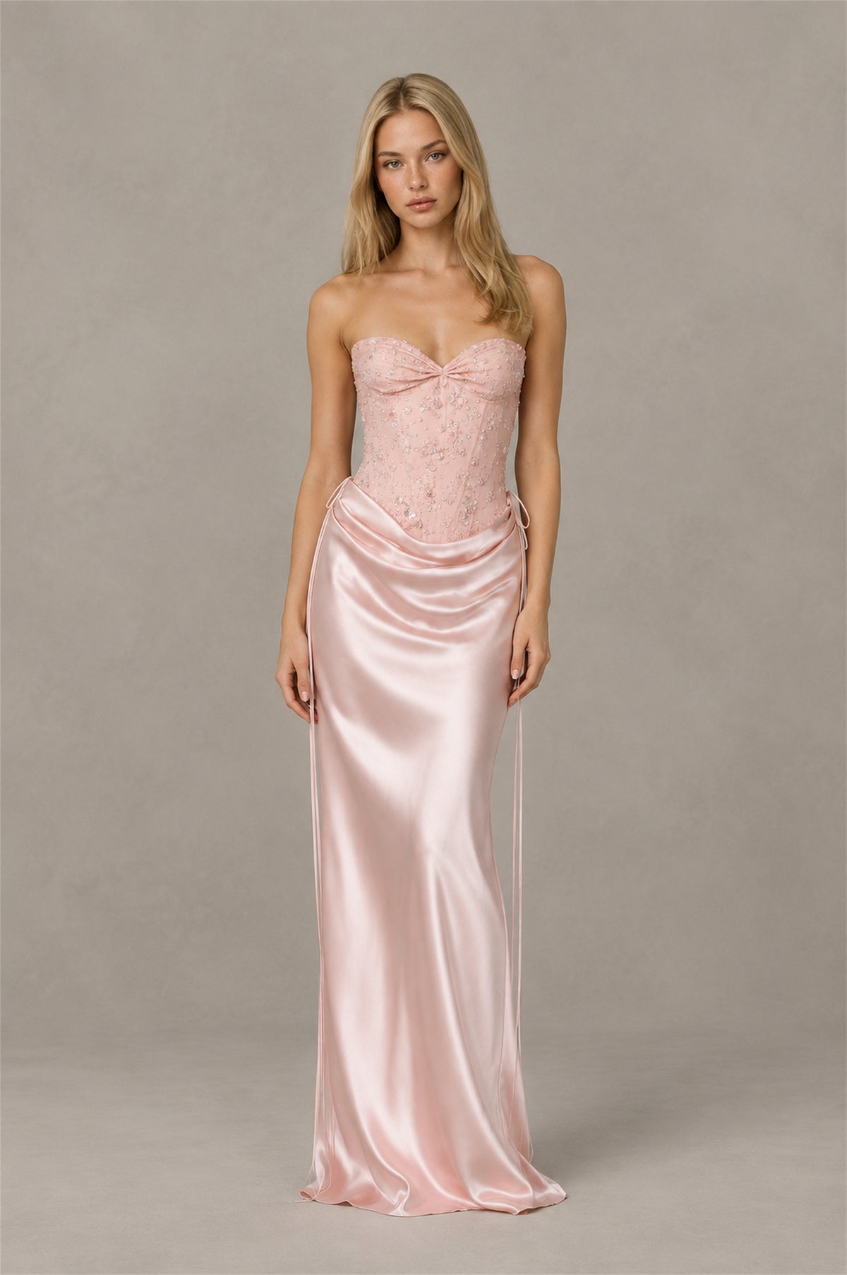 Blush pink satin-look formal maxi dress with draped waist and sweetheart bodice