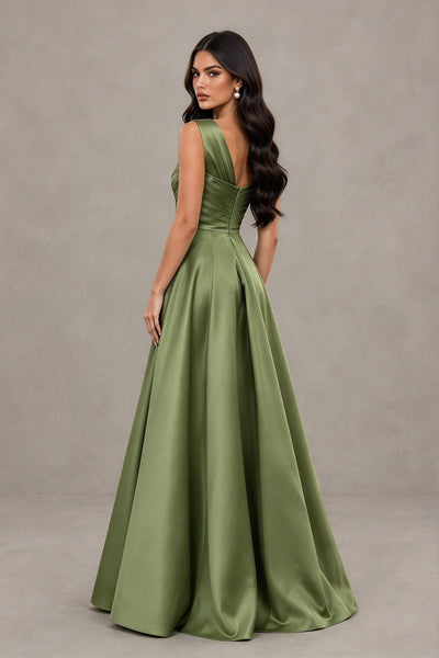 BOLODOO sage green satin gown detail showing pleated one shoulder bodice and statement bow