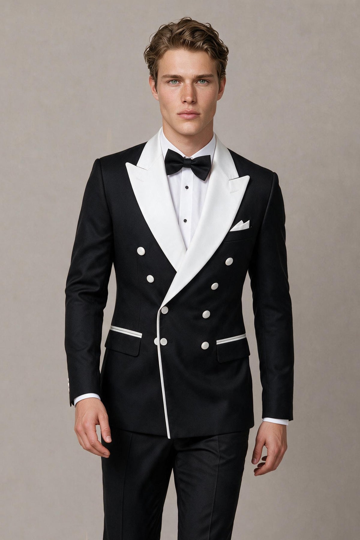 BOLODOO Men's Black Double-Breasted Tuxedo Blazer FQ0034 - front half-body close-up showing white peak lapel, six silver buttons and white contrast piping detail