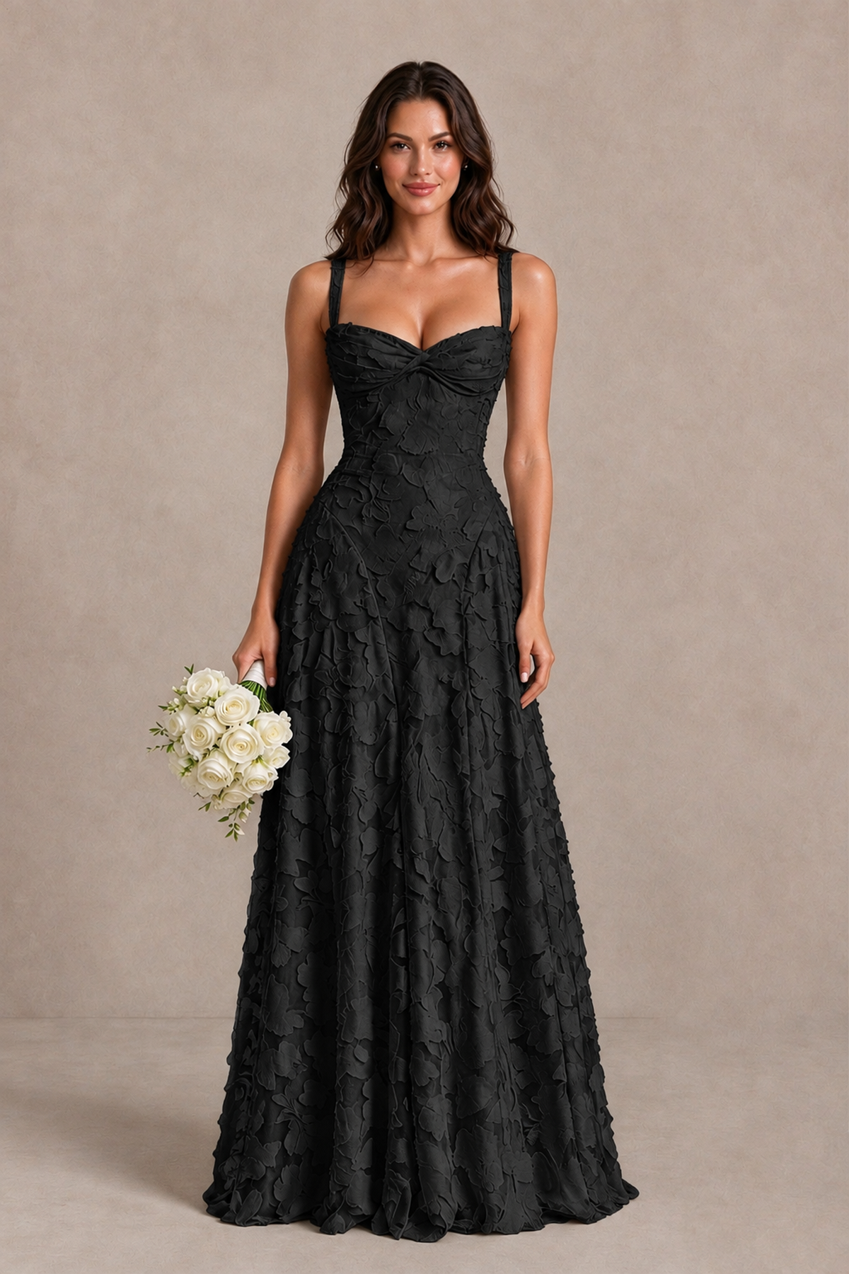 BOLODOO black sleeveless floor-length gown with raised floral texture, front view styled with bouquet