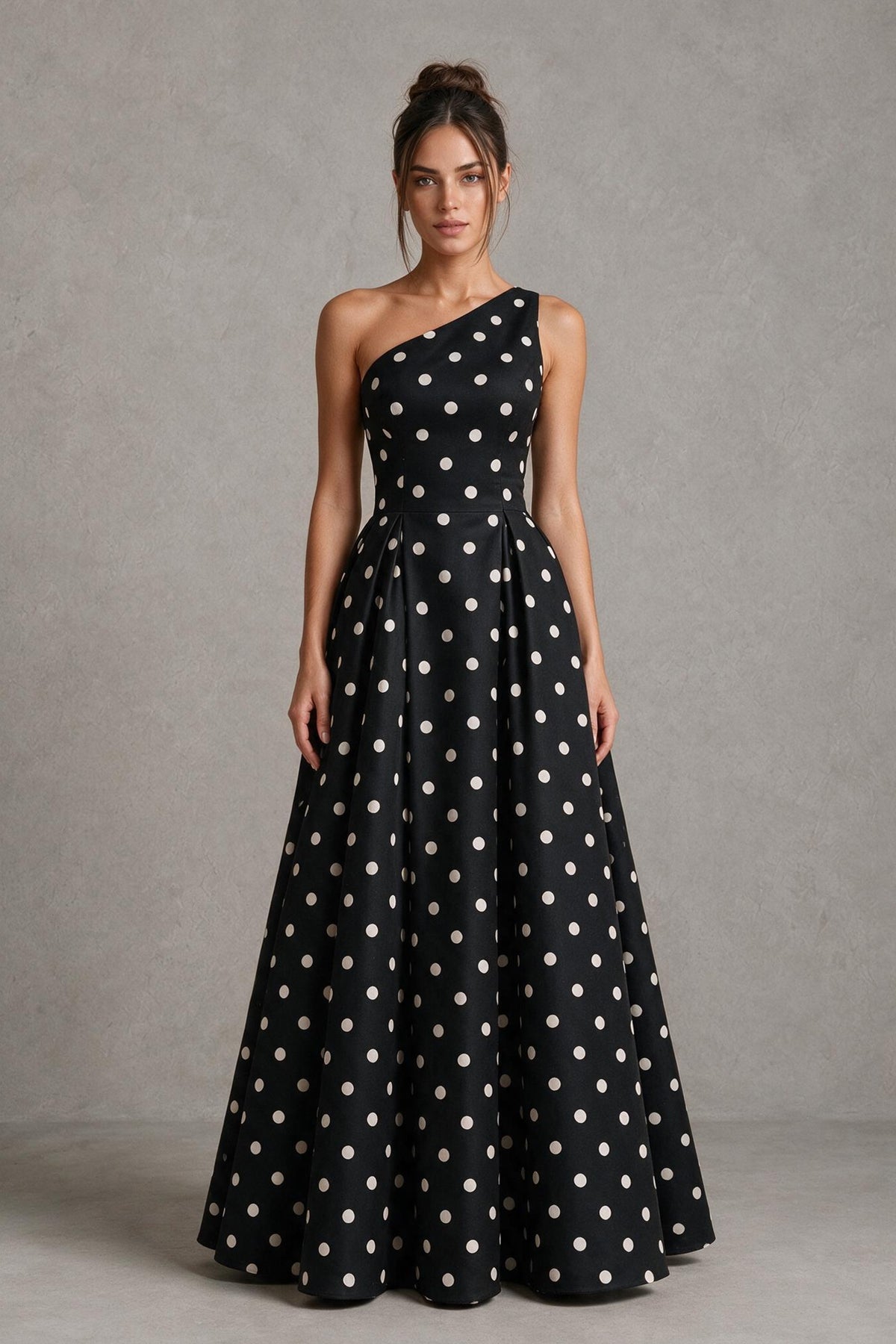 Black polka dot one-shoulder formal gown with sweeping full-length A-line skirt