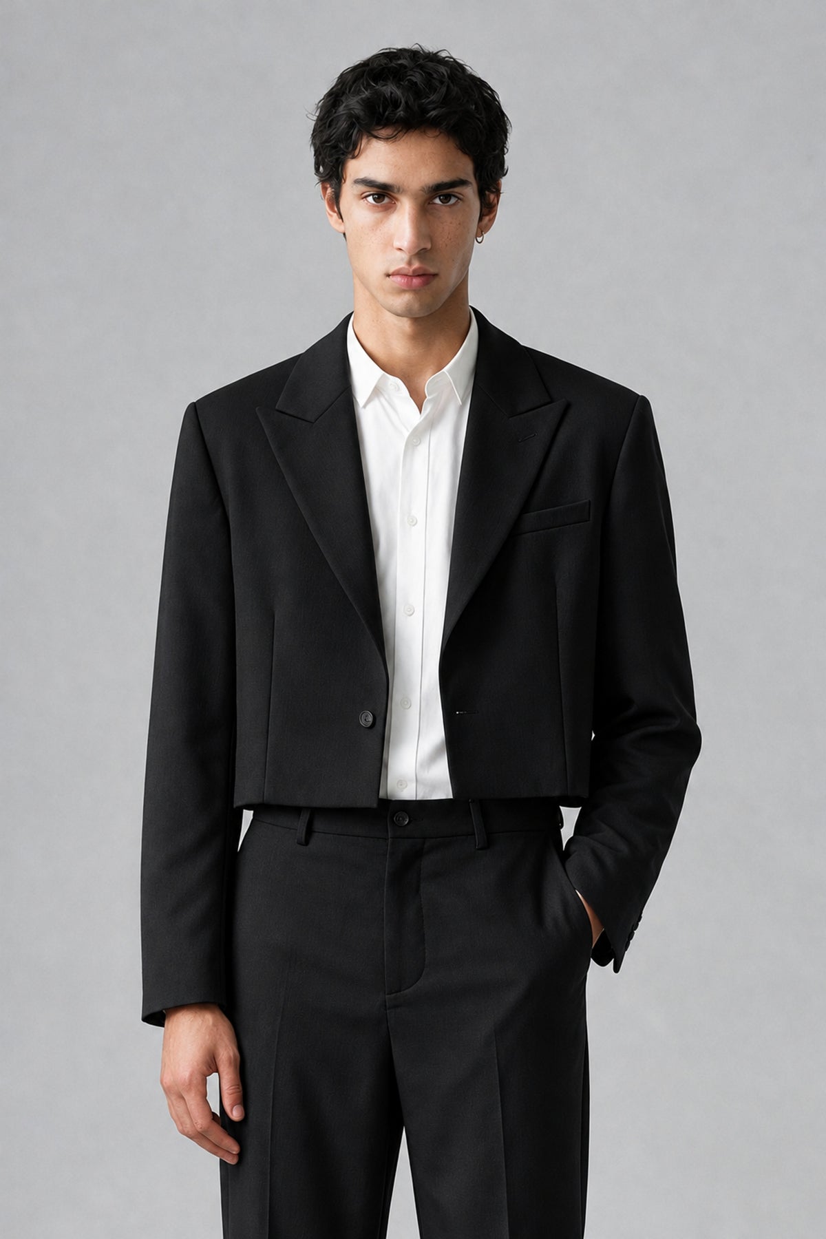 Bolodoo FQ1003 black cropped blazer with notched lapels, long sleeves and single-button front