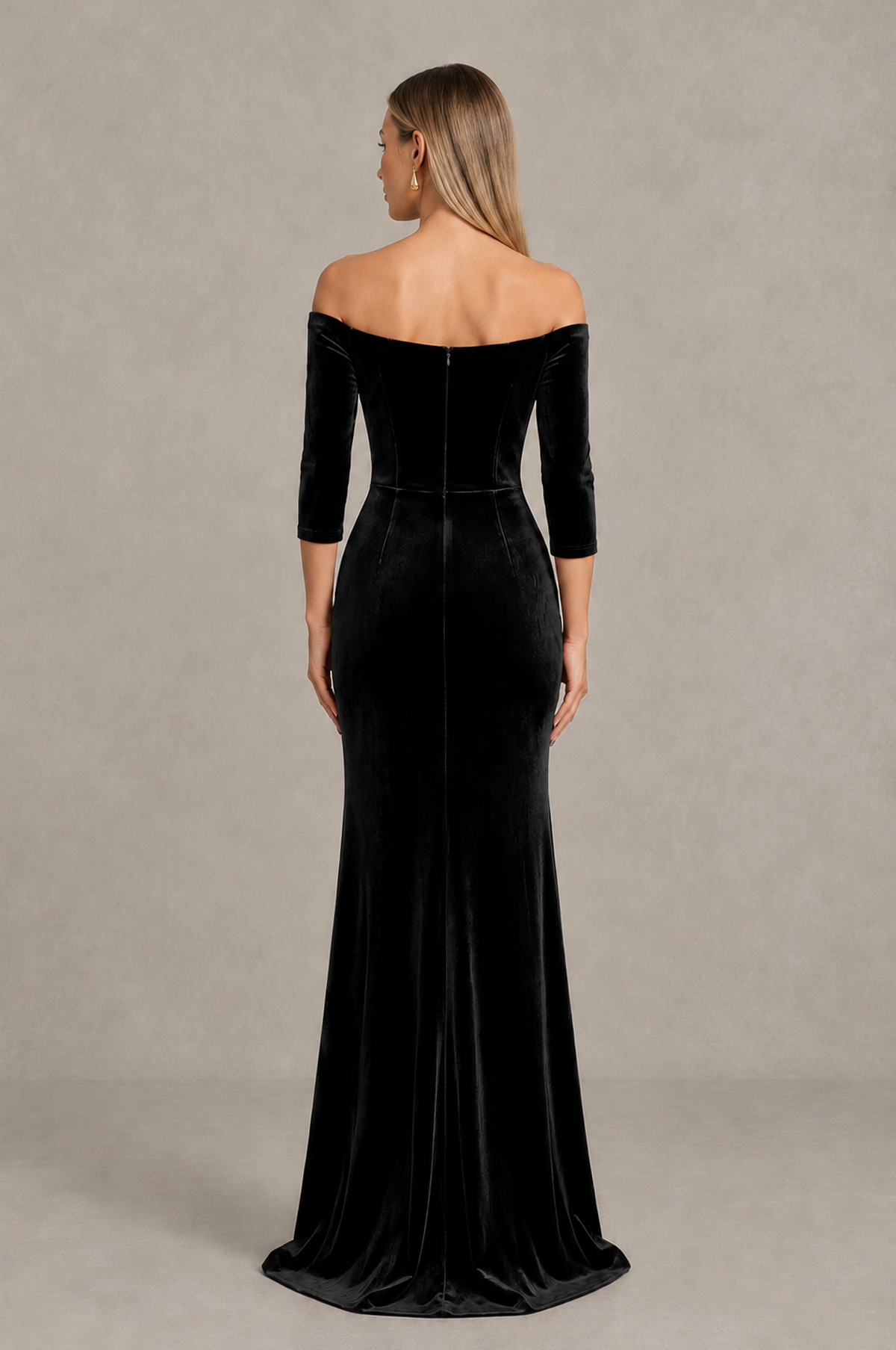 Back view of BOLODOO black velvet evening dress showing exposed upper back and center-back zipper