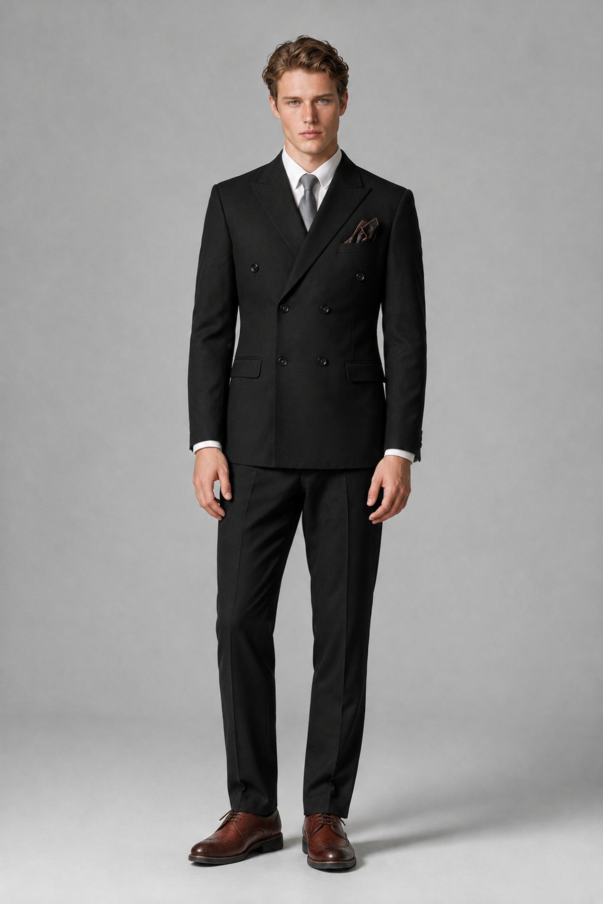 Black peak-lapel double-breasted suit jacket with six-button front and flap pockets