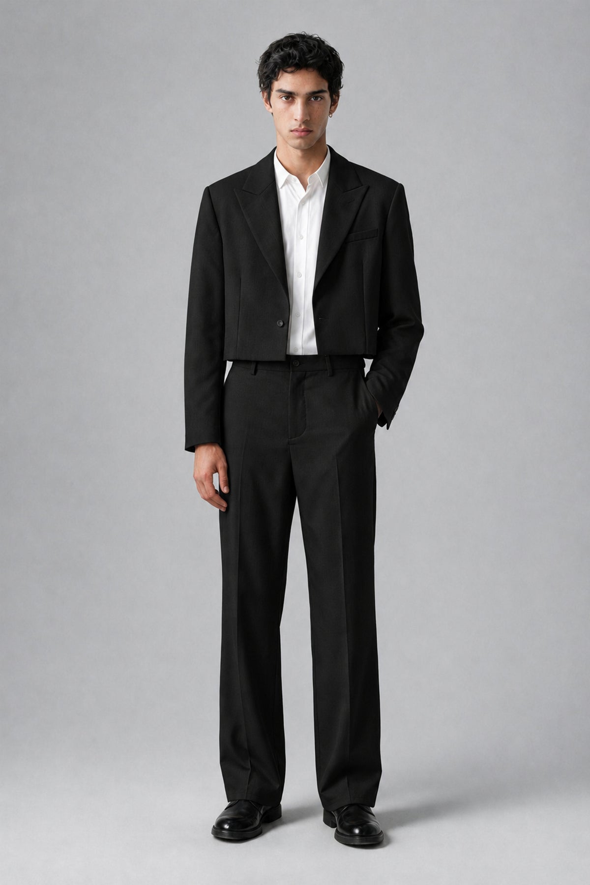 Bolodoo FQ1003 men's black two-piece suit with cropped blazer and wide-leg trousers, full front view