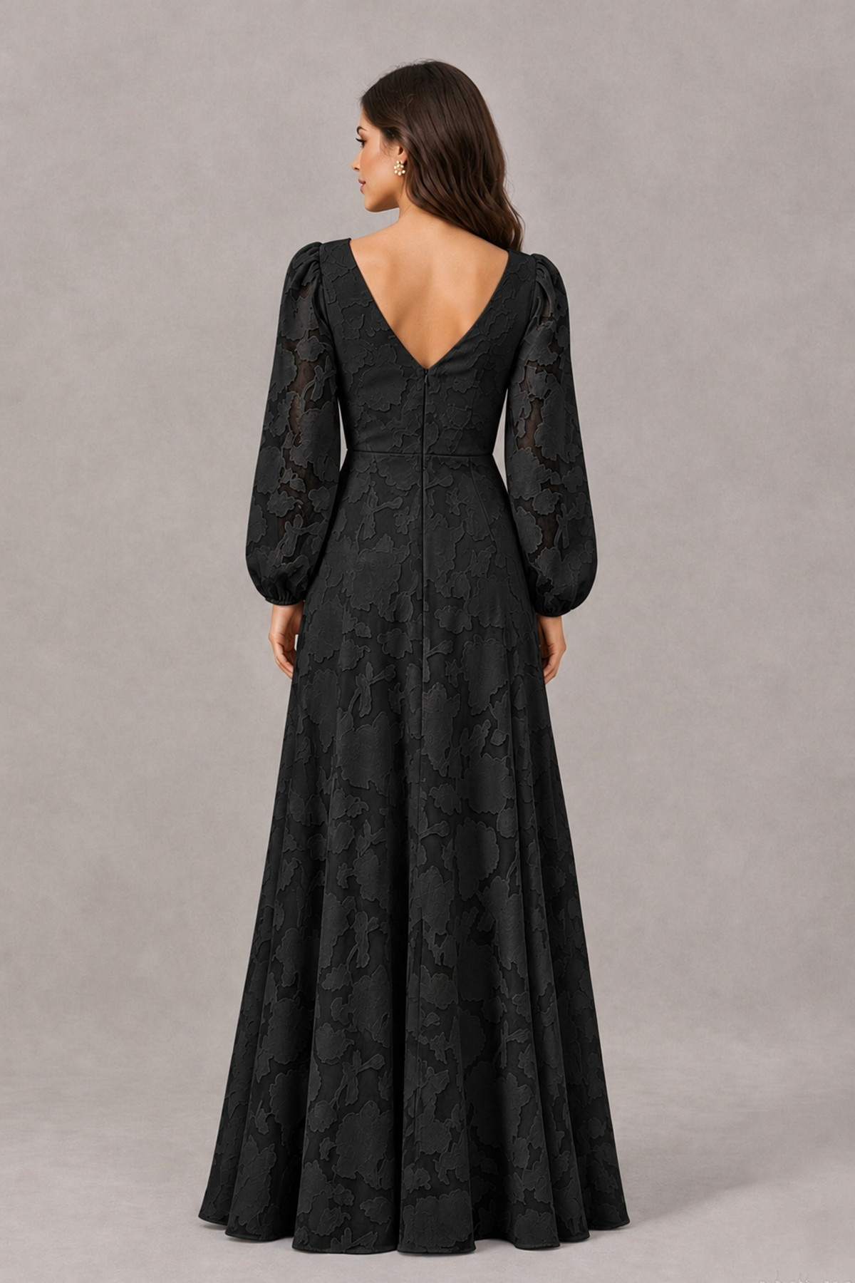Back view of BOLODOO XX096 black long sleeve gown showing V-back neckline and floral texture