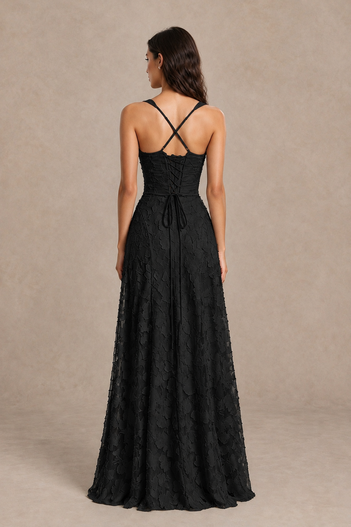 Back view of BOLODOO XX098 black gown showing crossed shoulder straps, open upper back and lace-up bodice